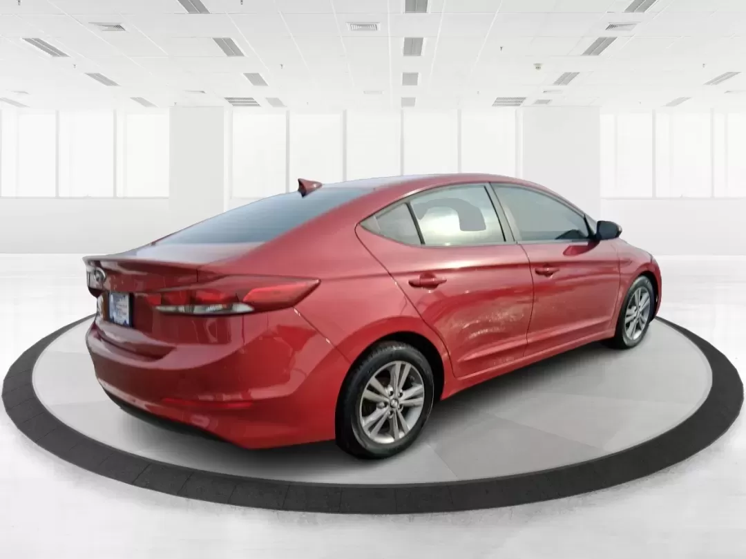 2017 Hyundai Elantra SE (KMHD84LF5HU) with an Nu 2L I-4 DOHC engine, 6A transmission, located at 1099 N County Rd 25A , Troy, OH, 45373, (937) 908-9800, 40.057079, -84.212883 - Planning a reliable daily commute from Troy to Dayton, a fuel-friendly run to the Miami Valley Centre Mall, or an easy weekend escape up I75? This 2017 Hyundai Elantra SE in eye-catching Scarlet Red Pearl is the kind of practical sedan that fits real life-comfortable for long drives, small enough fo - Photo#2
