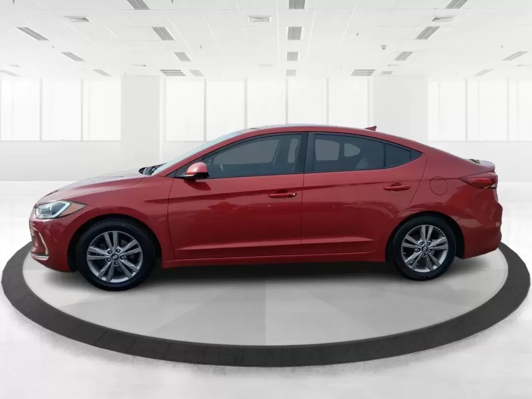 2017 Hyundai Elantra SE (KMHD84LF5HU) with an Nu 2L I-4 DOHC engine, 6A transmission, located at 1099 N County Rd 25A , Troy, OH, 45373, (937) 908-9800, 40.057079, -84.212883 - Planning a reliable daily commute from Troy to Dayton, a fuel-friendly run to the Miami Valley Centre Mall, or an easy weekend escape up I75? This 2017 Hyundai Elantra SE in eye-catching Scarlet Red Pearl is the kind of practical sedan that fits real life-comfortable for long drives, small enough fo - Photo#4