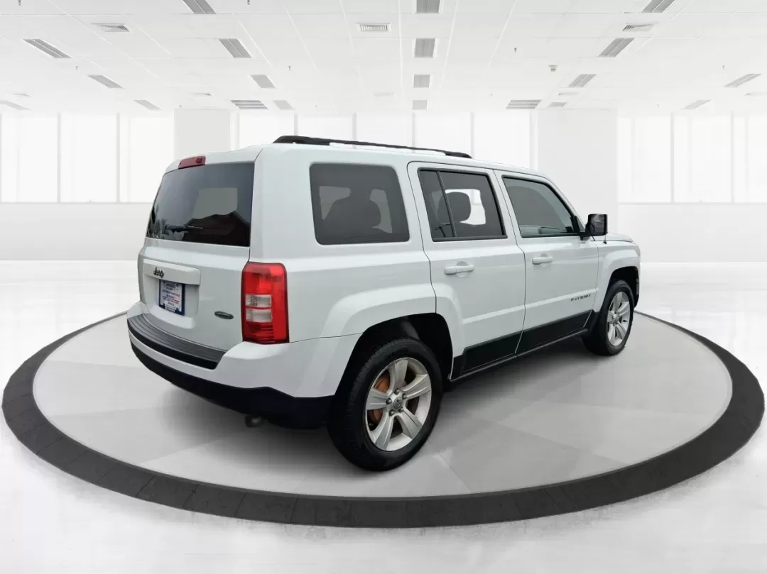 2016 Jeep Patriot Latitude (1C4NJPFA8GD) with an 2.0L L4 DOHC 16V engine, located at 1951 S Dayton Lakeview Rd., New Carlisle, OH, 45344, (937) 908-9800, 39.890999, -84.050255 - Picture your next weekend escape: loading up the gear, pointing the hood toward John Bryan State Park or a day trip to Dayton, and enjoying the confident, go-anywhere feel that makes a Jeep a Jeep. This **2016 Jeep Patriot Latitude** is a smart fit for commuters, first-time buyers, and budget-consci - Photo#2