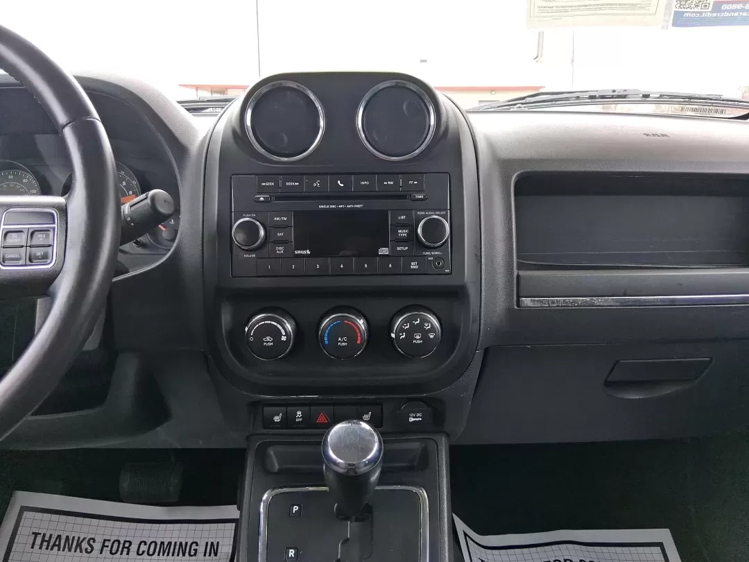 2016 Jeep Patriot Latitude (1C4NJPFA8GD) with an 2.0L L4 DOHC 16V engine, located at 1951 S Dayton Lakeview Rd., New Carlisle, OH, 45344, (937) 908-9800, 39.890999, -84.050255 - Picture your next weekend escape: loading up the gear, pointing the hood toward John Bryan State Park or a day trip to Dayton, and enjoying the confident, go-anywhere feel that makes a Jeep a Jeep. This **2016 Jeep Patriot Latitude** is a smart fit for commuters, first-time buyers, and budget-consci - Photo#13