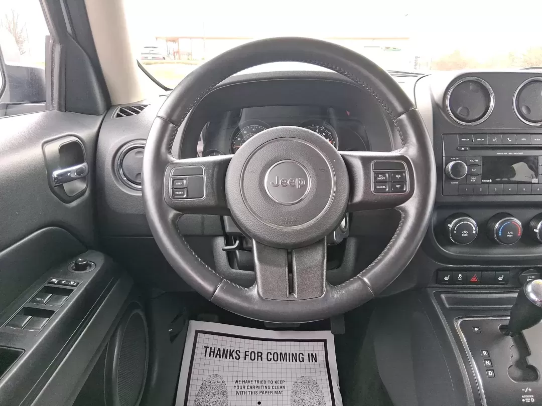 2016 Jeep Patriot Latitude (1C4NJPFA8GD) with an 2.0L L4 DOHC 16V engine, located at 1951 S Dayton Lakeview Rd., New Carlisle, OH, 45344, (937) 908-9800, 39.890999, -84.050255 - Picture your next weekend escape: loading up the gear, pointing the hood toward John Bryan State Park or a day trip to Dayton, and enjoying the confident, go-anywhere feel that makes a Jeep a Jeep. This **2016 Jeep Patriot Latitude** is a smart fit for commuters, first-time buyers, and budget-consci - Photo#16