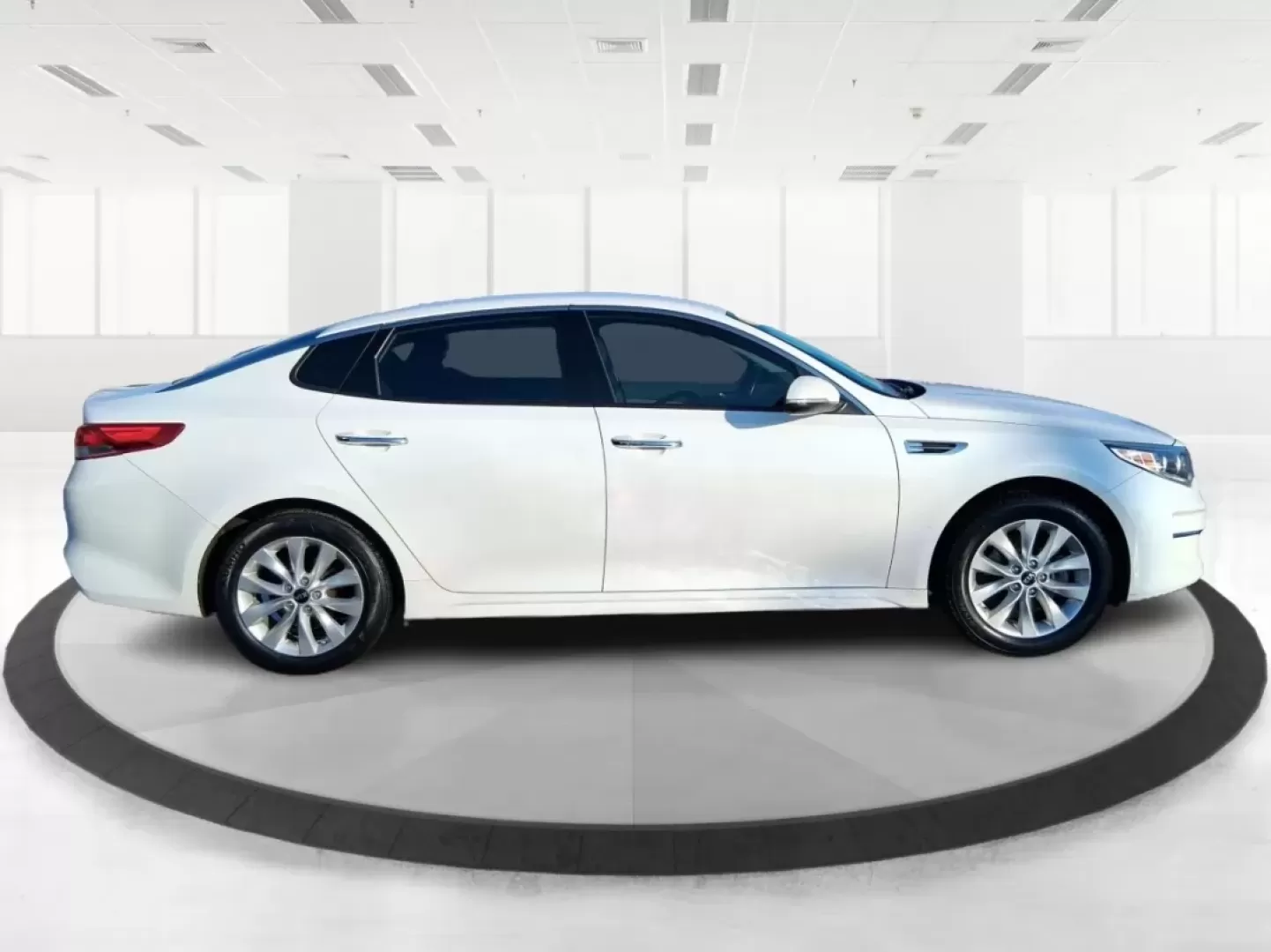 2016 Kia Optima EX (5XXGU4L31GG) with an Theta II 2.4L I-4 gasoline direct injection engine, 6A transmission, located at 880 E. National Road, Vandalia, OH, 45377, (937) 908-9800, 39.891918, -84.183594 - Whether you're a busy commuter heading down I75, a rideshare driver stacking miles, or a small family looking for a comfortable sedan for school runs and weekend errands, this 2016 Kia Optima EX is built for real-life driving in and around Vandalia, Ohio. Finished in Snow White Pearl, it delivers th - Photo#1