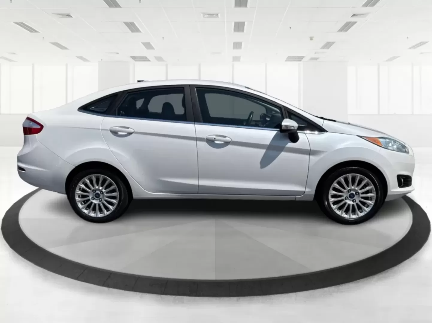 2016 Ford Fiesta Titanium (3FADP4CJ9GM) with an 1.6L I-4 DOHC engine, located at 880 E. National Road, Vandalia, OH, 45377, (937) 908-9800, 39.891918, -84.183594 - **Experience the Ultimate in Style and Comfort with the 2016 Ford Fiesta Titanium Sedan!**<br /> <br /> Are you looking for a stylish yet practical vehicle that fits seamlessly into your daily life? The 2016 Ford Fiesta Titanium Sedan is designed for those who crave sophistication without sacrificin - Photo#1