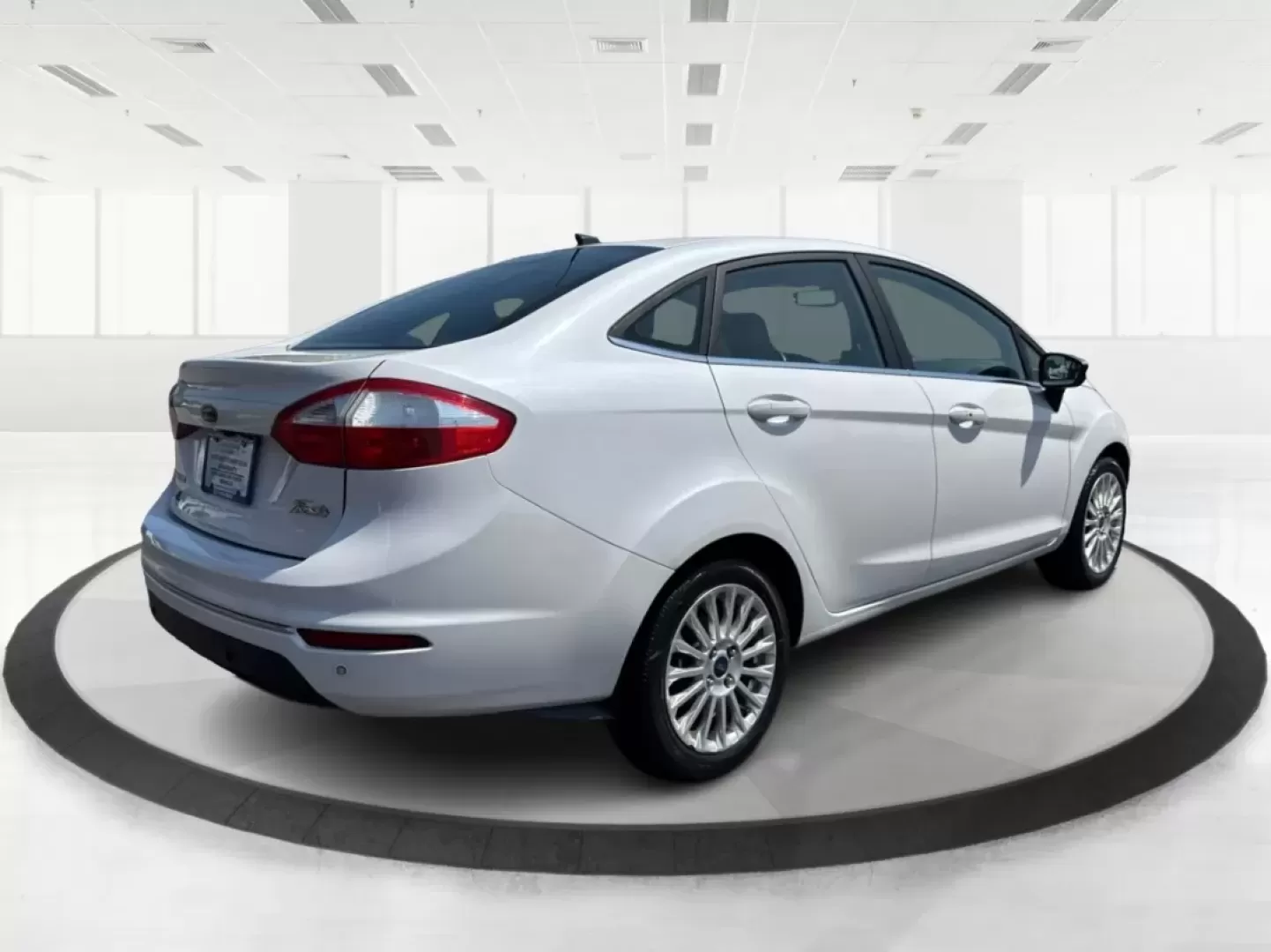 2016 Ford Fiesta Titanium (3FADP4CJ9GM) with an 1.6L I-4 DOHC engine, located at 880 E. National Road, Vandalia, OH, 45377, (937) 908-9800, 39.891918, -84.183594 - **Experience the Ultimate in Style and Comfort with the 2016 Ford Fiesta Titanium Sedan!**<br /> <br /> Are you looking for a stylish yet practical vehicle that fits seamlessly into your daily life? The 2016 Ford Fiesta Titanium Sedan is designed for those who crave sophistication without sacrificin - Photo#2