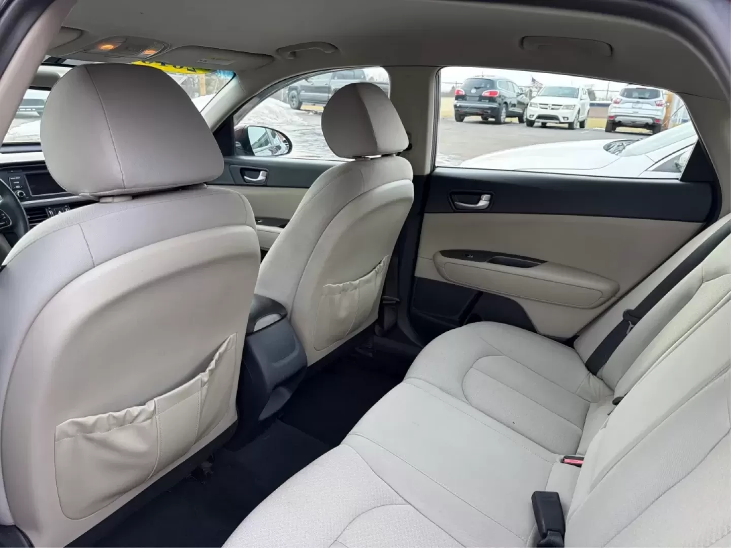 2016 Kia Optima LX (5XXGT4L32GG) with an Theta II 2.4L I-4 gasoline direct injection engine, 6A transmission, located at 1184 Kauffman Ave, Fairborn, OH, 45324, (937) 908-9800, 39.807072, -84.030914 - Picture your next week going smoother: an easy morning commute down I-675, a quick run to The Mall at Fairfield Commons, and a comfortable weekend drive past Wright State University or out toward the National Museum of the U.S. Air Force-without stressing about your budget. This 2016 Kia Optima LX s - Photo#10