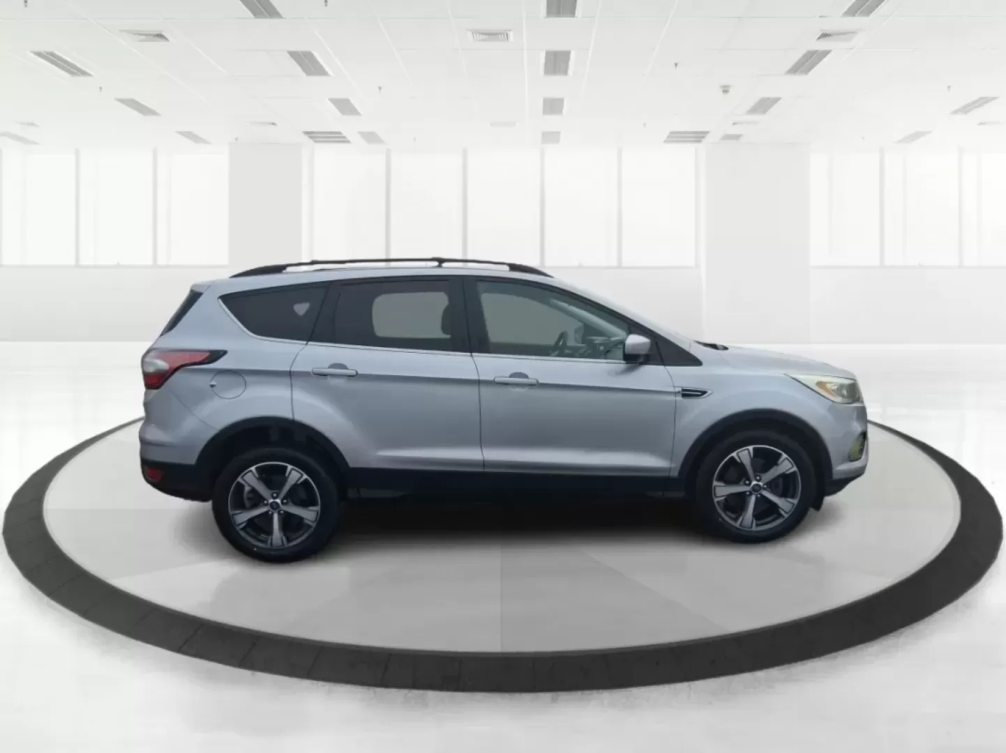 2017 Ford Escape SE (1FMCU0GD5HU) with an 1.5L L4 DOHC 16V engine, 6A transmission, located at 1099 N County Rd 25A , Troy, OH, 45373, (937) 908-9800, 40.057079, -84.212883 - Picture your next Ohio weekend: a quick run up I75 for errands, a family day at Treasure Island Park, or a spontaneous road trip to Dayton-without worrying about space, comfort, or winter-ready confidence. This 2017 Ford Escape SE SUV is built for real life in Troy, offering the easy maneuverability - Photo#1