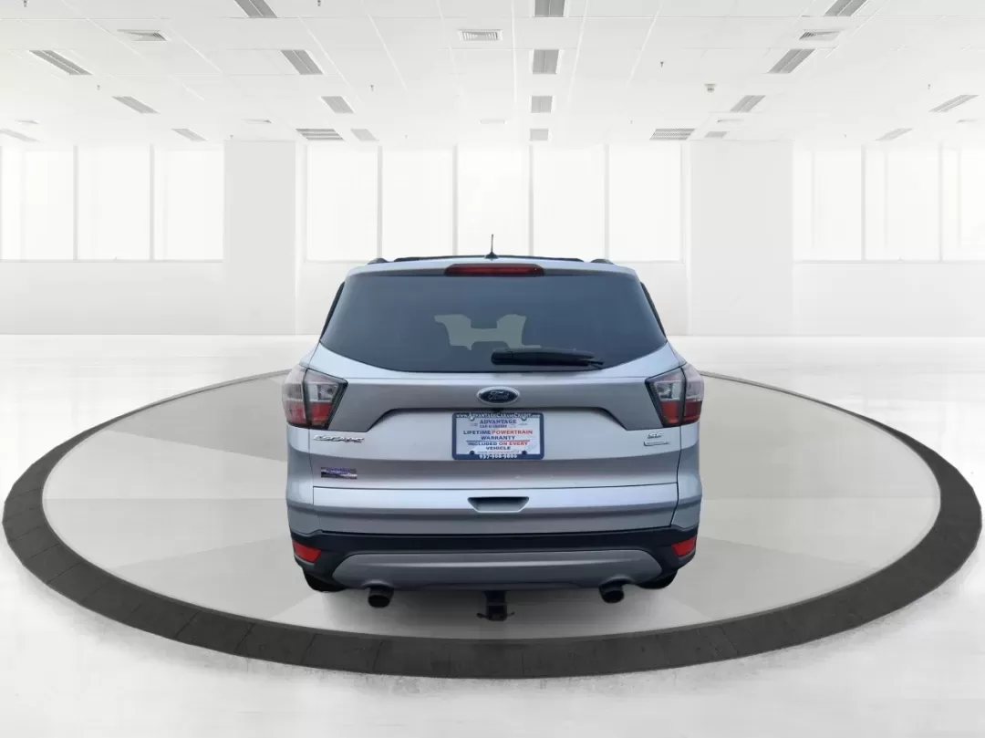 2017 Ford Escape SE (1FMCU0GD5HU) with an 1.5L L4 DOHC 16V engine, 6A transmission, located at 1099 N County Rd 25A , Troy, OH, 45373, (937) 908-9800, 40.057079, -84.212883 - Picture your next Ohio weekend: a quick run up I75 for errands, a family day at Treasure Island Park, or a spontaneous road trip to Dayton-without worrying about space, comfort, or winter-ready confidence. This 2017 Ford Escape SE SUV is built for real life in Troy, offering the easy maneuverability - Photo#3