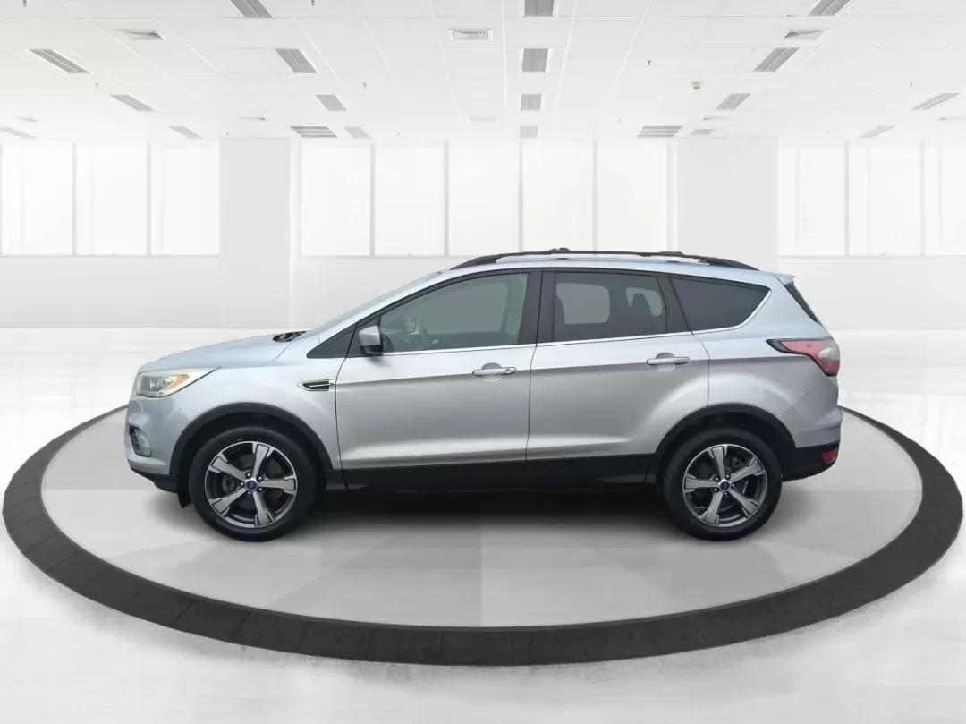 2017 Ford Escape SE (1FMCU0GD5HU) with an 1.5L L4 DOHC 16V engine, 6A transmission, located at 1099 N County Rd 25A , Troy, OH, 45373, (937) 908-9800, 40.057079, -84.212883 - Picture your next Ohio weekend: a quick run up I75 for errands, a family day at Treasure Island Park, or a spontaneous road trip to Dayton-without worrying about space, comfort, or winter-ready confidence. This 2017 Ford Escape SE SUV is built for real life in Troy, offering the easy maneuverability - Photo#5