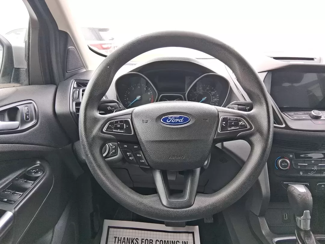 2017 Ford Escape SE (1FMCU0GD5HU) with an 1.5L L4 DOHC 16V engine, 6A transmission, located at 1099 N County Rd 25A , Troy, OH, 45373, (937) 908-9800, 40.057079, -84.212883 - Picture your next Ohio weekend: a quick run up I75 for errands, a family day at Treasure Island Park, or a spontaneous road trip to Dayton-without worrying about space, comfort, or winter-ready confidence. This 2017 Ford Escape SE SUV is built for real life in Troy, offering the easy maneuverability - Photo#16