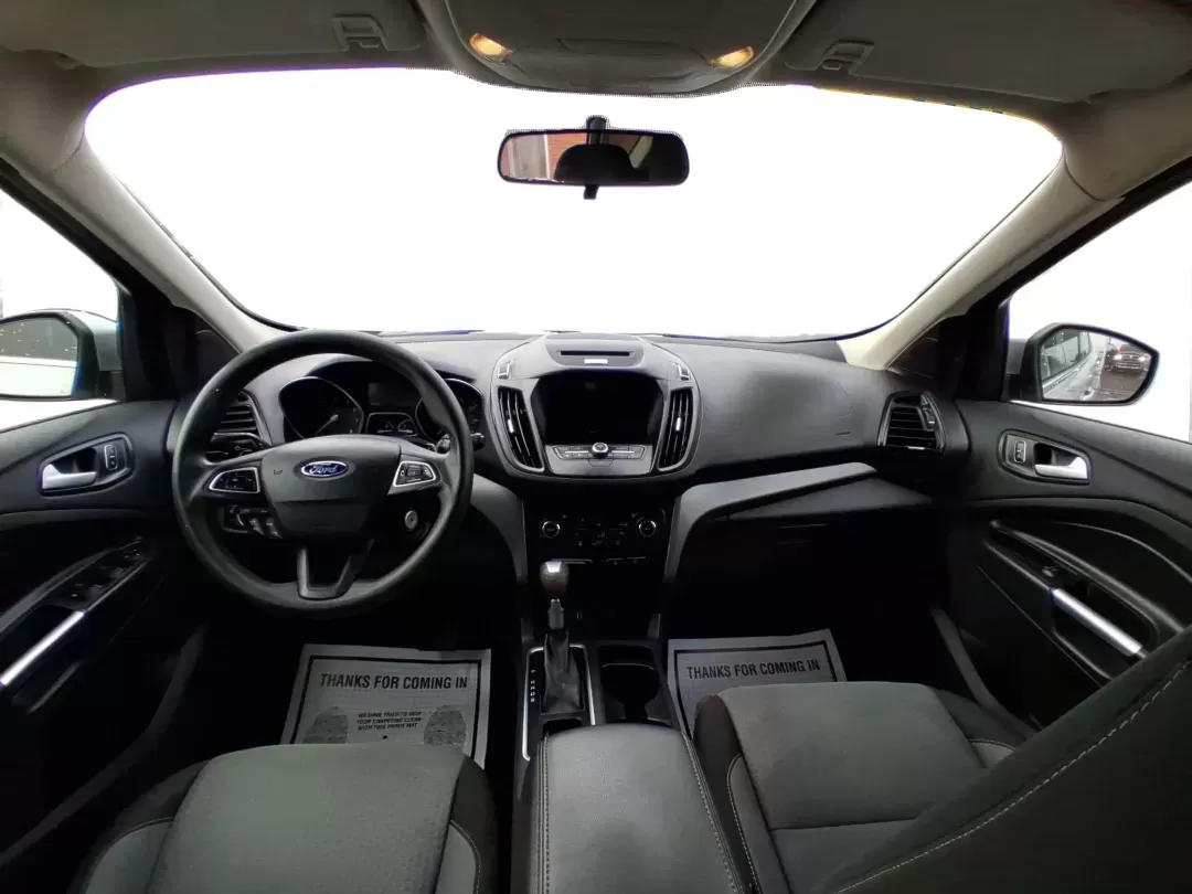 2017 Ford Escape SE (1FMCU0GD5HU) with an 1.5L L4 DOHC 16V engine, 6A transmission, located at 1099 N County Rd 25A , Troy, OH, 45373, (937) 908-9800, 40.057079, -84.212883 - Picture your next Ohio weekend: a quick run up I75 for errands, a family day at Treasure Island Park, or a spontaneous road trip to Dayton-without worrying about space, comfort, or winter-ready confidence. This 2017 Ford Escape SE SUV is built for real life in Troy, offering the easy maneuverability - Photo#21