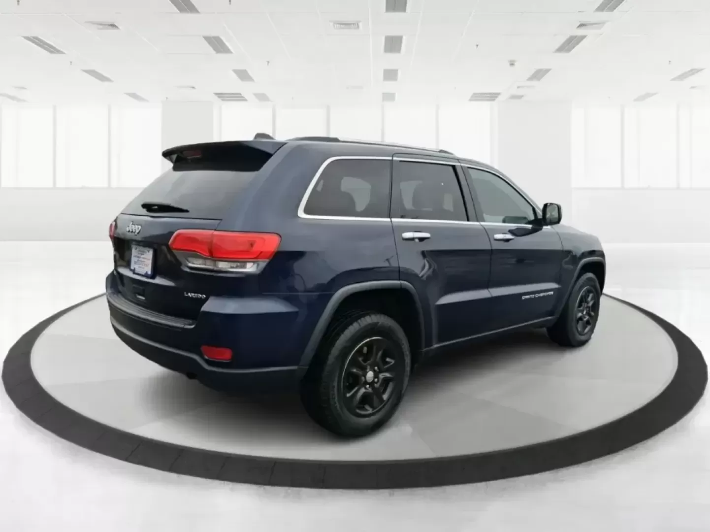 2015 Jeep Grand Cherokee Laredo (1C4RJFAG1FC) with an 3.6L V-6 DOHC engine, 8-Speed Automatic transmission, located at 1951 S Dayton Lakeview Rd., New Carlisle, OH, 45344, (937) 908-9800, 39.890999, -84.050255 - Picture a weekend that starts with a smooth commute through Clark County and ends with a spontaneous road trip-camp gear in the back, friends in the second row, and confidence when the weather turns. This 2015 Jeep Grand Cherokee Laredo is built for real life in Ohio: school runs, long drives down I - Photo#2