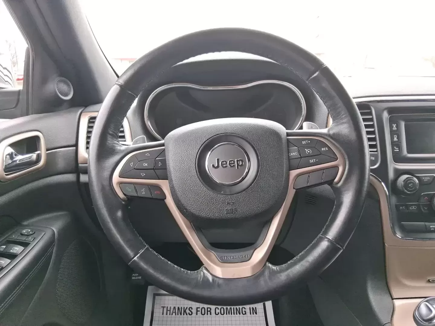 2015 Jeep Grand Cherokee Laredo (1C4RJFAG1FC) with an 3.6L V-6 DOHC engine, 8-Speed Automatic transmission, located at 1951 S Dayton Lakeview Rd., New Carlisle, OH, 45344, (937) 908-9800, 39.890999, -84.050255 - Picture a weekend that starts with a smooth commute through Clark County and ends with a spontaneous road trip-camp gear in the back, friends in the second row, and confidence when the weather turns. This 2015 Jeep Grand Cherokee Laredo is built for real life in Ohio: school runs, long drives down I - Photo#16