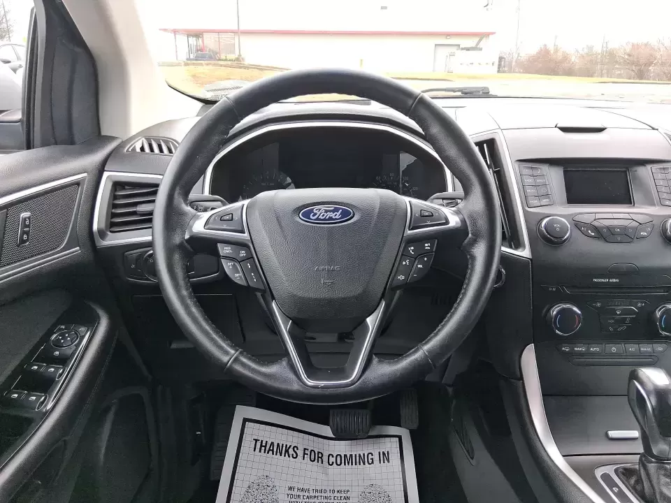 2018 Ford Edge SEL (2FMPK4J95JB) with an 2.0L L4 DOHC 16V engine, 6A transmission, located at 8750 N County Rd 25A, Piqua, OH, 45356, (937) 908-9800, 40.164391, -84.232513 - Load up the family, point the hood toward a weekend getaway, and enjoy the confident, all-weather versatility that makes an SUV the go-to choice in Ohio-this 2018 Ford Edge SEL is built for real life, from school runs and grocery trips to road trips out toward Indian Lake or a day exploring downtown - Photo#16