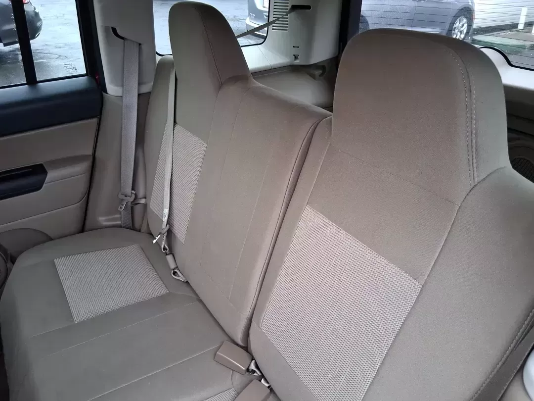 2012 Jeep Patriot Latitude (1C4NJPFB0CD) with an 2.4L L4 DOHC 16V engine, located at 1099 N County Rd 25A , Troy, OH, 45373, (937) 908-9800, 40.057079, -84.212883 - Picture your next weekend: a quick run up I-75 for a family visit, a scenic drive past the Miami River, then an easy loop back through downtown Troy for dinner-without worrying about whether your SUV can keep up with daily life. This 2012 Jeep Patriot Latitude is built for practical adventures and e - Photo#10