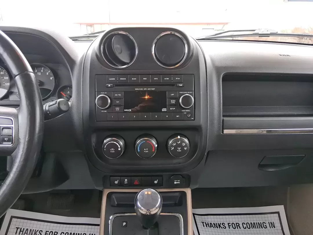 2012 Jeep Patriot Latitude (1C4NJPFB0CD) with an 2.4L L4 DOHC 16V engine, located at 1099 N County Rd 25A , Troy, OH, 45373, (937) 908-9800, 40.057079, -84.212883 - Picture your next weekend: a quick run up I-75 for a family visit, a scenic drive past the Miami River, then an easy loop back through downtown Troy for dinner-without worrying about whether your SUV can keep up with daily life. This 2012 Jeep Patriot Latitude is built for practical adventures and e - Photo#13