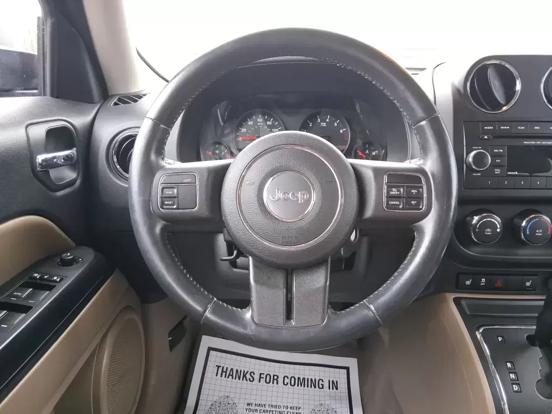 2012 Jeep Patriot Latitude (1C4NJPFB0CD) with an 2.4L L4 DOHC 16V engine, located at 1099 N County Rd 25A , Troy, OH, 45373, (937) 908-9800, 40.057079, -84.212883 - Picture your next weekend: a quick run up I-75 for a family visit, a scenic drive past the Miami River, then an easy loop back through downtown Troy for dinner-without worrying about whether your SUV can keep up with daily life. This 2012 Jeep Patriot Latitude is built for practical adventures and e - Photo#16