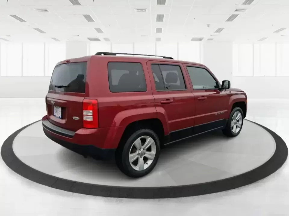 2012 Jeep Patriot Latitude (1C4NJPFB0CD) with an 2.4L L4 DOHC 16V engine, located at 1230 East Main St, Xenia, OH, 45385, (937) 908-9800, 39.688026, -83.910172 - Picture your next weekend: a quick run up I-75 for a family visit, a scenic drive past the Miami River, then an easy loop back through downtown Troy for dinner-without worrying about whether your SUV can keep up with daily life. This 2012 Jeep Patriot Latitude is built for practical adventures and e - Photo#2