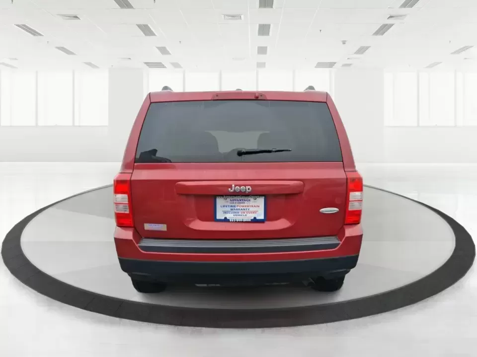 2012 Jeep Patriot Latitude (1C4NJPFB0CD) with an 2.4L L4 DOHC 16V engine, located at 1230 East Main St, Xenia, OH, 45385, (937) 908-9800, 39.688026, -83.910172 - Picture your next weekend: a quick run up I-75 for a family visit, a scenic drive past the Miami River, then an easy loop back through downtown Troy for dinner-without worrying about whether your SUV can keep up with daily life. This 2012 Jeep Patriot Latitude is built for practical adventures and e - Photo#3