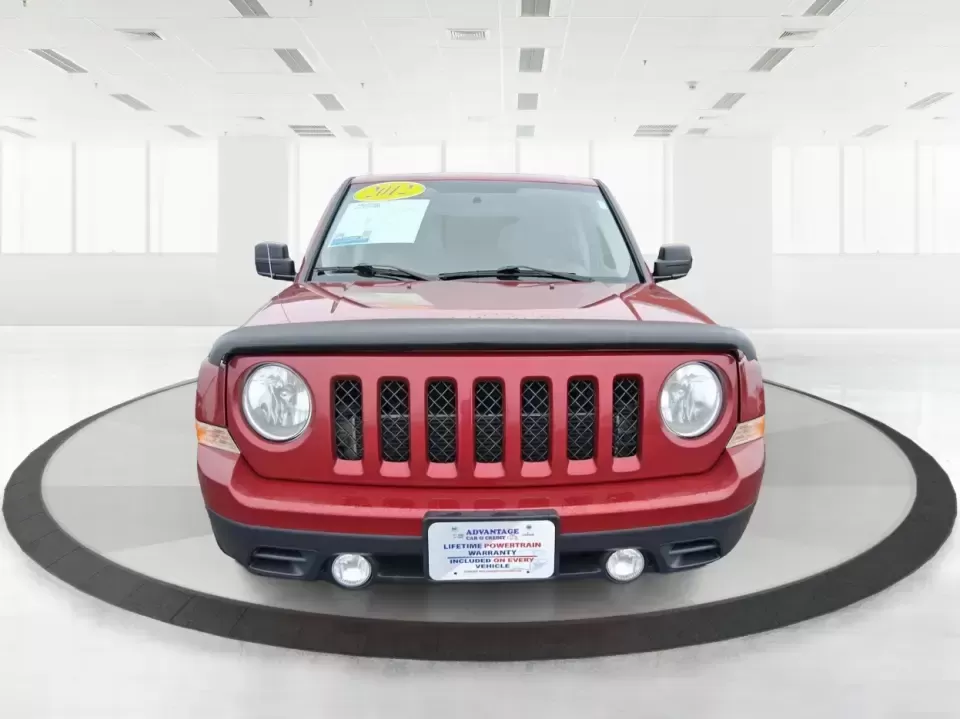 2012 Jeep Patriot Latitude (1C4NJPFB0CD) with an 2.4L L4 DOHC 16V engine, located at 1230 East Main St, Xenia, OH, 45385, (937) 908-9800, 39.688026, -83.910172 - Picture your next weekend: a quick run up I-75 for a family visit, a scenic drive past the Miami River, then an easy loop back through downtown Troy for dinner-without worrying about whether your SUV can keep up with daily life. This 2012 Jeep Patriot Latitude is built for practical adventures and e - Photo#7