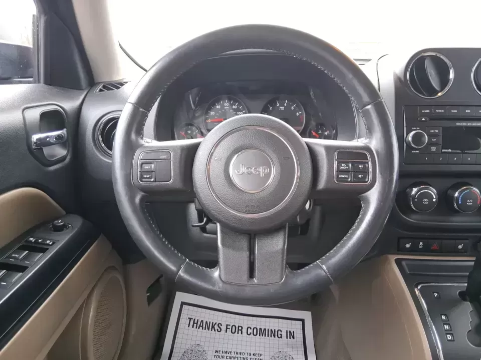 2012 Jeep Patriot Latitude (1C4NJPFB0CD) with an 2.4L L4 DOHC 16V engine, located at 1230 East Main St, Xenia, OH, 45385, (937) 908-9800, 39.688026, -83.910172 - Picture your next weekend: a quick run up I-75 for a family visit, a scenic drive past the Miami River, then an easy loop back through downtown Troy for dinner-without worrying about whether your SUV can keep up with daily life. This 2012 Jeep Patriot Latitude is built for practical adventures and e - Photo#16