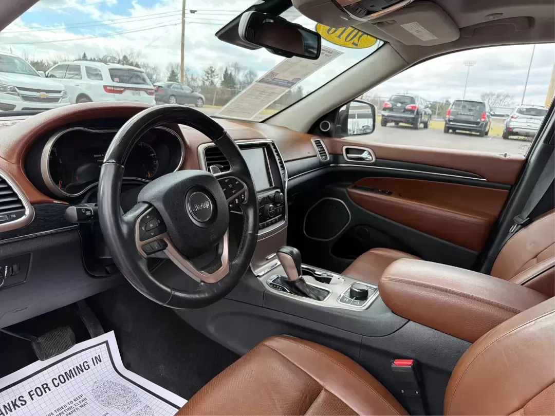2016 Jeep Grand Cherokee Summit (1C4RJFJGXGC) with an 3.6L V6 DOHC 24V engine, 8A transmission, located at 1184 Kauffman Ave, Fairborn, OH, 45324, (937) 908-9800, 39.807072, -84.030914 - Pack the cooler, load up the family, and point the hood toward your next weekend escape-this 2016 Jeep Grand Cherokee Summit 4WD is built for Ohio life, from daily commutes across town to road trips out toward Hocking Hills. With its confident SUV stance, upscale Summit trim, and go-anywhere capabil - Photo#9