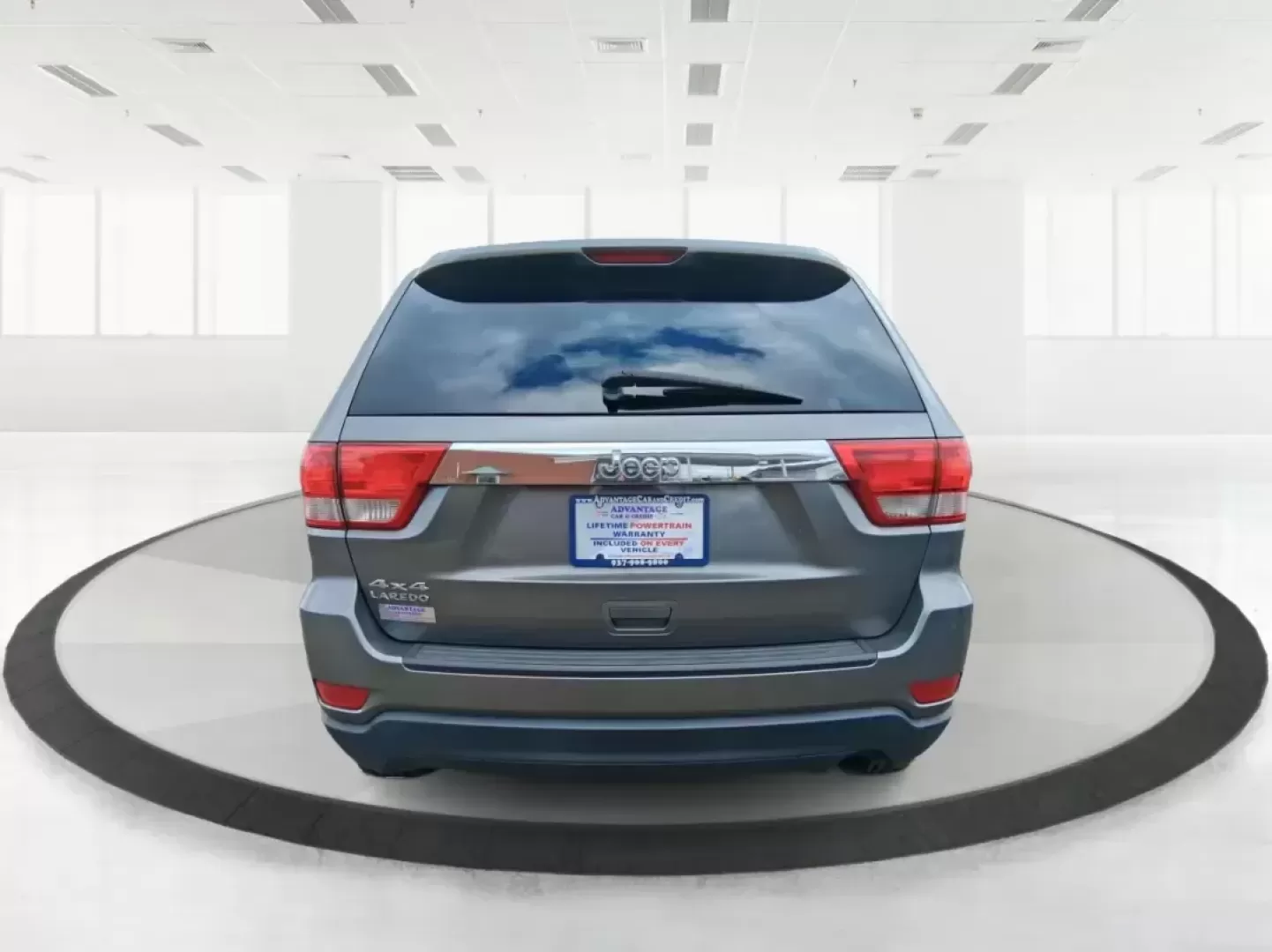 2013 Jeep Grand Cherokee Laredo (1C4RJFAG1DC) with an 3.6L V6 DOHC 24V engine, 5-Speed Automatic transmission, located at 401 Woodman Dr, Riverside, OH, 45431, (937) 908-9800, 39.760899, -84.123421 - Pack up the family, point the hood toward the next weekend getaway, and enjoy the confidence that comes with a capable SUV built for real life in Ohio. This 2013 Jeep Grand Cherokee Laredo in Mineral Gray Metallic Clearcoat is the kind of vehicle that fits your routine Monday through Friday-then tur - Photo#3