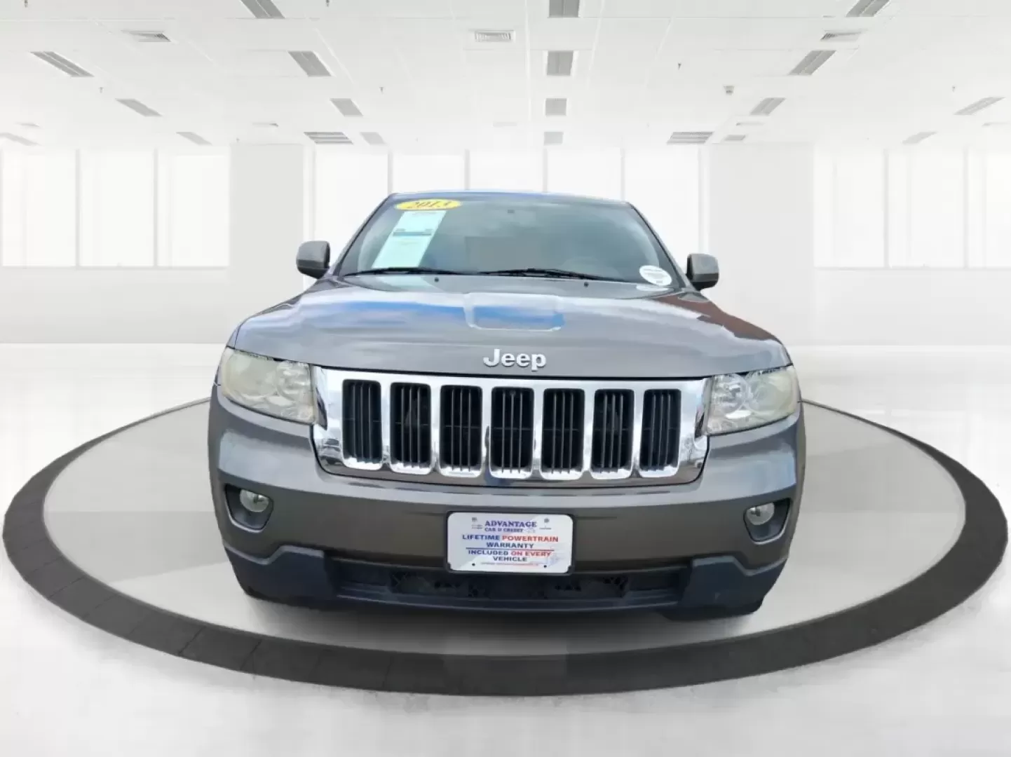 2013 Jeep Grand Cherokee Laredo (1C4RJFAG1DC) with an 3.6L V6 DOHC 24V engine, 5-Speed Automatic transmission, located at 401 Woodman Dr, Riverside, OH, 45431, (937) 908-9800, 39.760899, -84.123421 - Pack up the family, point the hood toward the next weekend getaway, and enjoy the confidence that comes with a capable SUV built for real life in Ohio. This 2013 Jeep Grand Cherokee Laredo in Mineral Gray Metallic Clearcoat is the kind of vehicle that fits your routine Monday through Friday-then tur - Photo#7