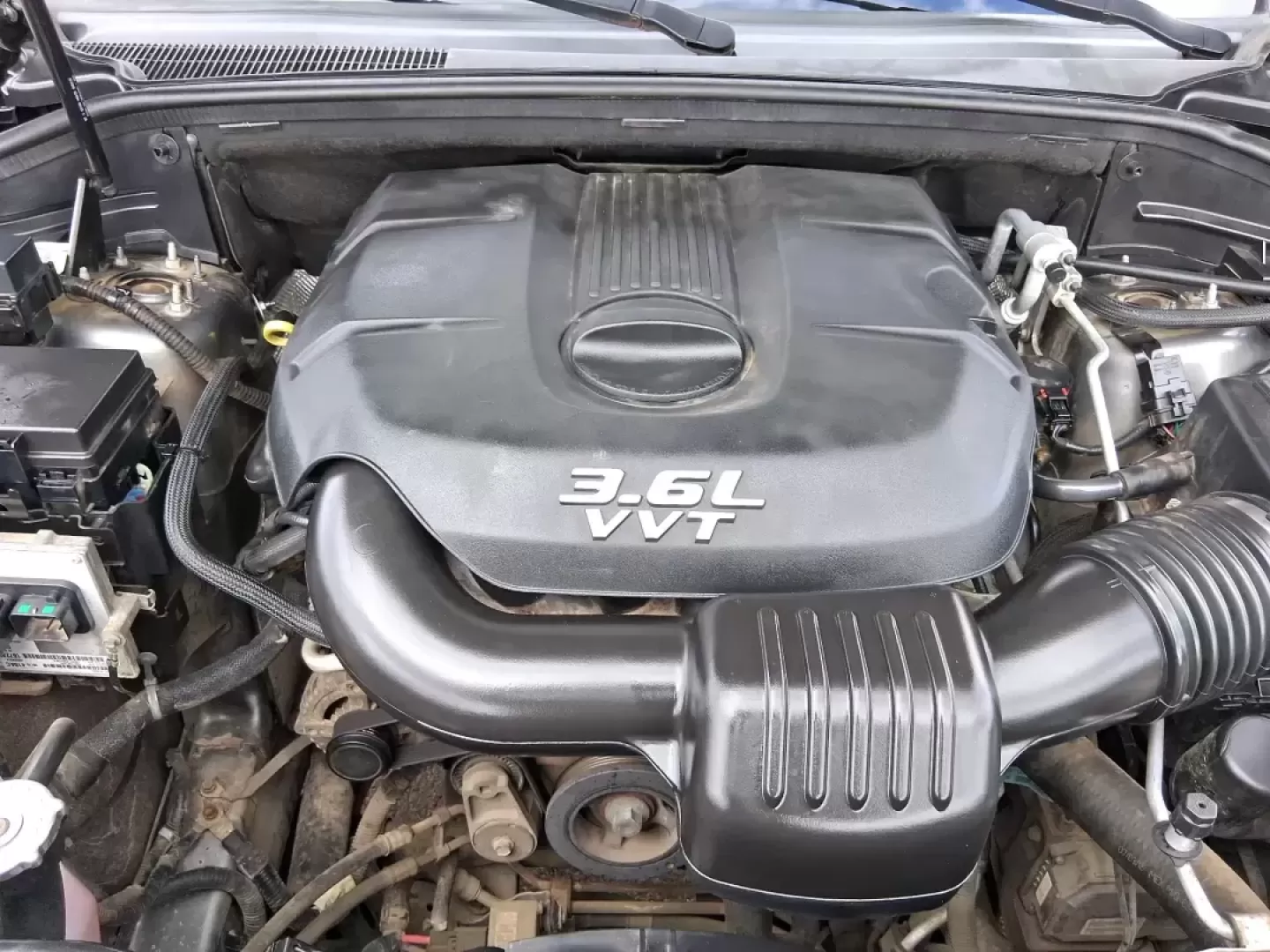 2013 Jeep Grand Cherokee Laredo (1C4RJFAG1DC) with an 3.6L V6 DOHC 24V engine, 5-Speed Automatic transmission, located at 401 Woodman Dr, Riverside, OH, 45431, (937) 908-9800, 39.760899, -84.123421 - Pack up the family, point the hood toward the next weekend getaway, and enjoy the confidence that comes with a capable SUV built for real life in Ohio. This 2013 Jeep Grand Cherokee Laredo in Mineral Gray Metallic Clearcoat is the kind of vehicle that fits your routine Monday through Friday-then tur - Photo#11