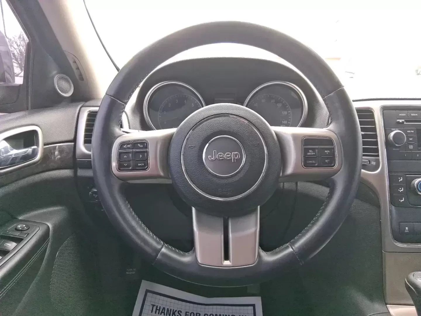 2013 Jeep Grand Cherokee Laredo (1C4RJFAG1DC) with an 3.6L V6 DOHC 24V engine, 5-Speed Automatic transmission, located at 401 Woodman Dr, Riverside, OH, 45431, (937) 908-9800, 39.760899, -84.123421 - Pack up the family, point the hood toward the next weekend getaway, and enjoy the confidence that comes with a capable SUV built for real life in Ohio. This 2013 Jeep Grand Cherokee Laredo in Mineral Gray Metallic Clearcoat is the kind of vehicle that fits your routine Monday through Friday-then tur - Photo#16