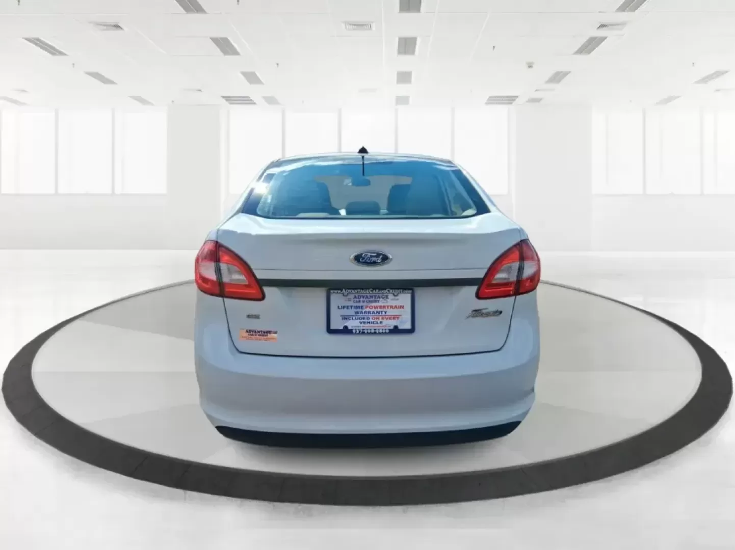 2013 Ford Fiesta SE (3FADP4BJXDM) with an 1.6L I-4 DOHC engine, located at 1951 S Dayton Lakeview Rd., New Carlisle, OH, 45344, (937) 908-9800, 39.890999, -84.050255 - Need a smart, efficient commuter that's easy to park downtown, nimble on I70, and still comfortable for weekend errands or a quick getaway to Springfield or Dayton? This 2013 Ford Fiesta SE Sedan in Oxford White delivers practical daily driving with the kind of budget-friendly ownership that fits re - Photo#3