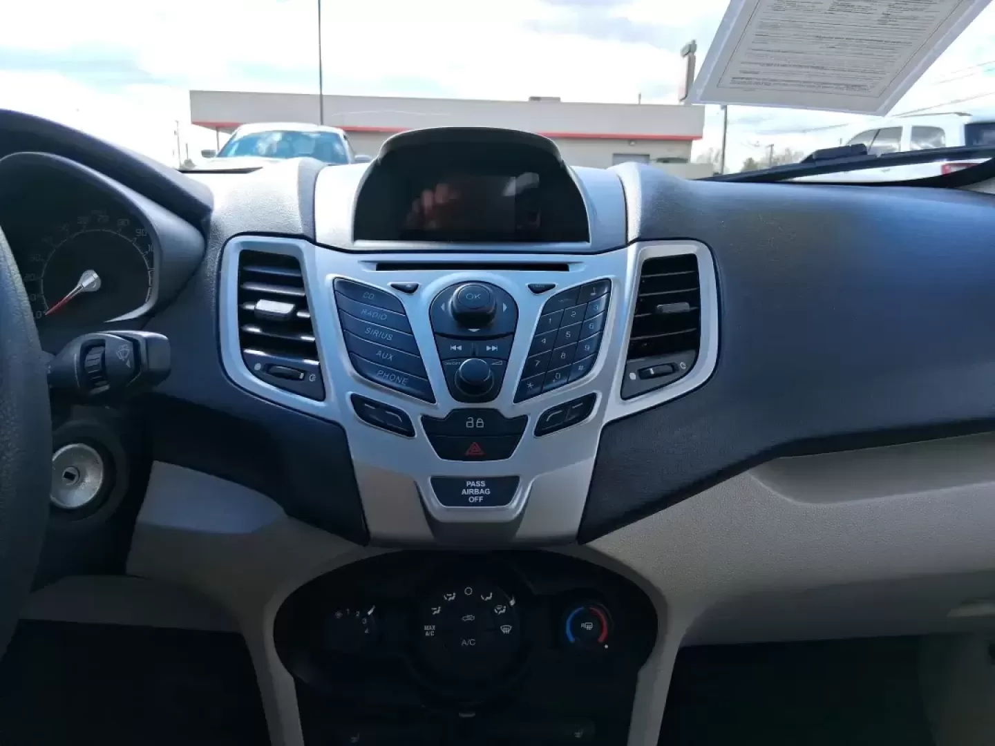 2013 Ford Fiesta SE (3FADP4BJXDM) with an 1.6L I-4 DOHC engine, located at 1951 S Dayton Lakeview Rd., New Carlisle, OH, 45344, (937) 908-9800, 39.890999, -84.050255 - Need a smart, efficient commuter that's easy to park downtown, nimble on I70, and still comfortable for weekend errands or a quick getaway to Springfield or Dayton? This 2013 Ford Fiesta SE Sedan in Oxford White delivers practical daily driving with the kind of budget-friendly ownership that fits re - Photo#13