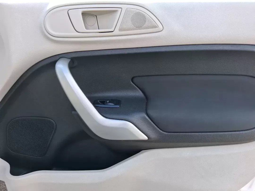 2013 Ford Fiesta SE (3FADP4BJXDM) with an 1.6L I-4 DOHC engine, located at 1951 S Dayton Lakeview Rd., New Carlisle, OH, 45344, (937) 908-9800, 39.890999, -84.050255 - Need a smart, efficient commuter that's easy to park downtown, nimble on I70, and still comfortable for weekend errands or a quick getaway to Springfield or Dayton? This 2013 Ford Fiesta SE Sedan in Oxford White delivers practical daily driving with the kind of budget-friendly ownership that fits re - Photo#19