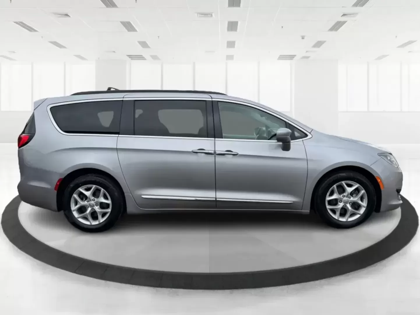2017 Chrysler Pacifica Touring-L (2C4RC1BG1HR) with an Pentastar 3.6L V-6 DOHC engine, 6A transmission, located at 401 Woodman Dr, Riverside, OH, 45431, (937) 908-9800, 39.760899, -84.123421 - Life gets busy fast-school drop-offs, long commutes, weekend tournaments, and road trips that somehow require half the house. If you need one vehicle that can handle the everyday grind and still feel comfortable when you're headed out for a family getaway, this **2017 Chrysler Pacifica Touring-L** i - Photo#1