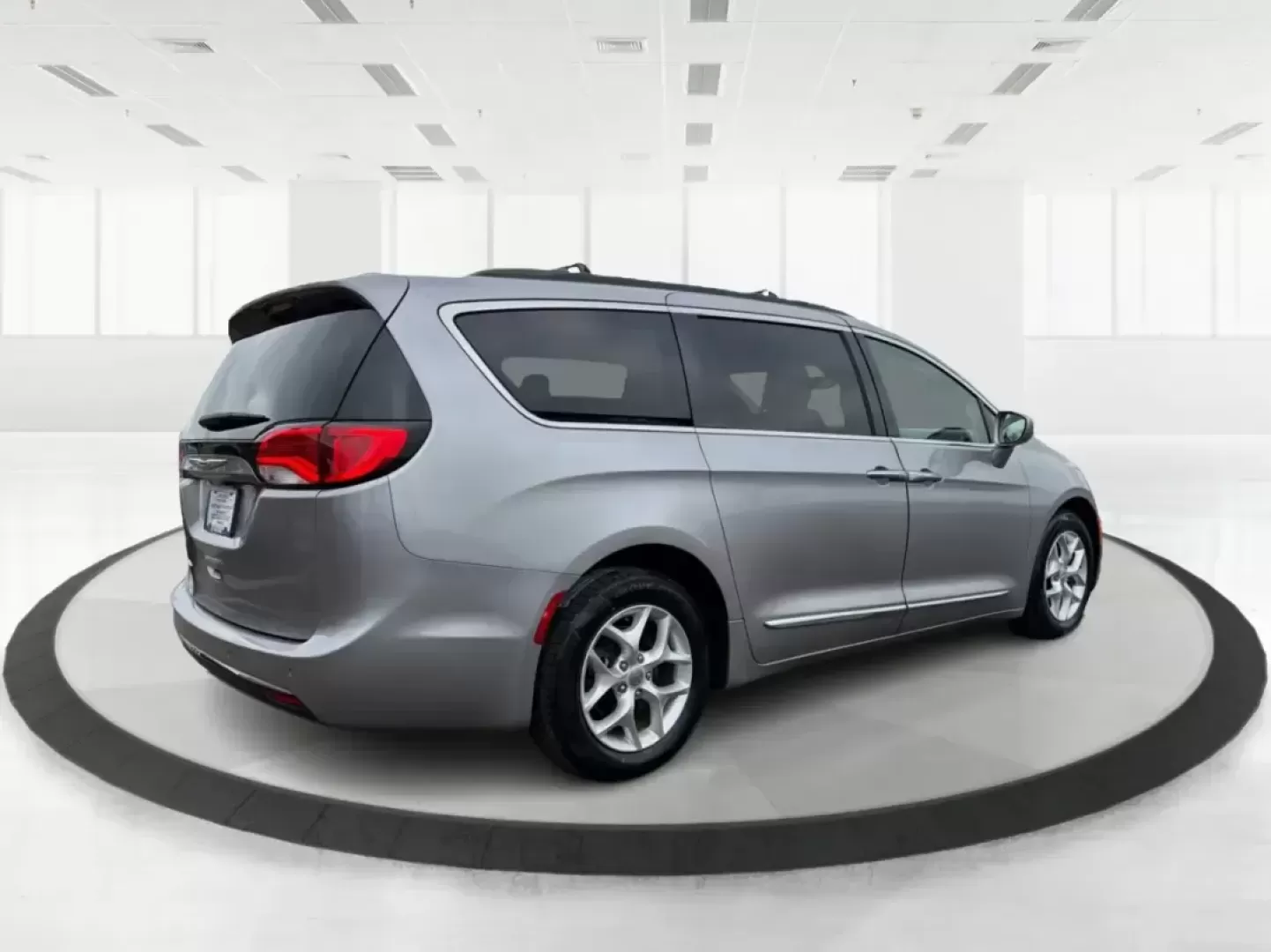 2017 Chrysler Pacifica Touring-L (2C4RC1BG1HR) with an Pentastar 3.6L V-6 DOHC engine, 6A transmission, located at 401 Woodman Dr, Riverside, OH, 45431, (937) 908-9800, 39.760899, -84.123421 - Life gets busy fast-school drop-offs, long commutes, weekend tournaments, and road trips that somehow require half the house. If you need one vehicle that can handle the everyday grind and still feel comfortable when you're headed out for a family getaway, this **2017 Chrysler Pacifica Touring-L** i - Photo#2