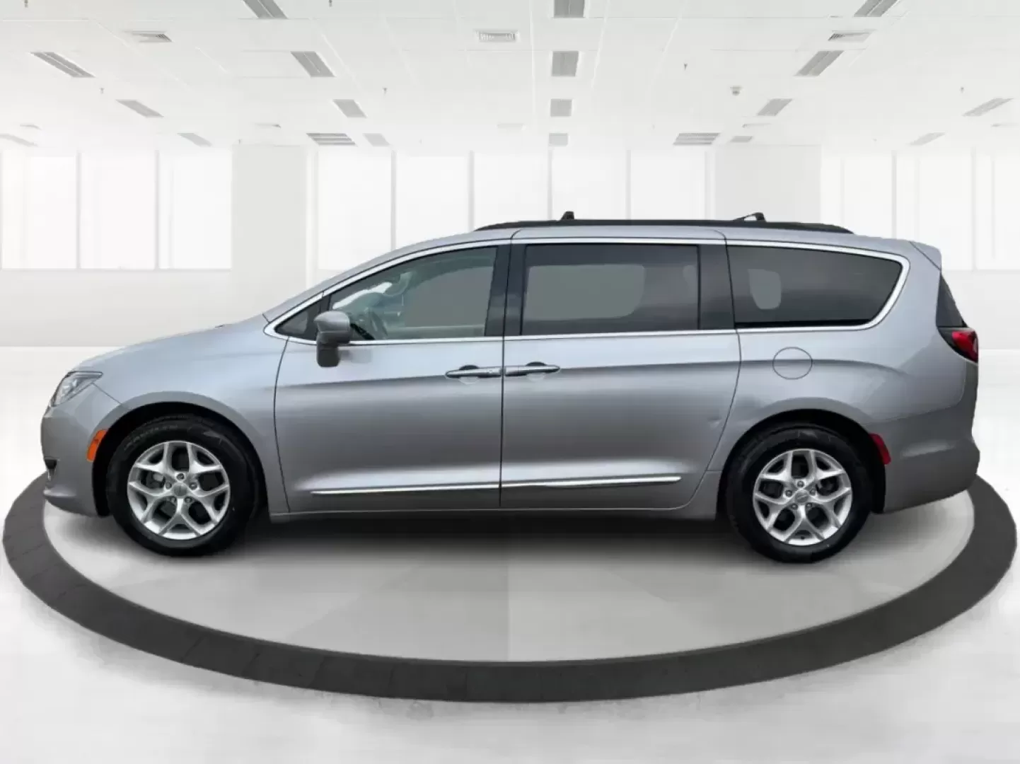 2017 Chrysler Pacifica Touring-L (2C4RC1BG1HR) with an Pentastar 3.6L V-6 DOHC engine, 6A transmission, located at 401 Woodman Dr, Riverside, OH, 45431, (937) 908-9800, 39.760899, -84.123421 - Life gets busy fast-school drop-offs, long commutes, weekend tournaments, and road trips that somehow require half the house. If you need one vehicle that can handle the everyday grind and still feel comfortable when you're headed out for a family getaway, this **2017 Chrysler Pacifica Touring-L** i - Photo#5