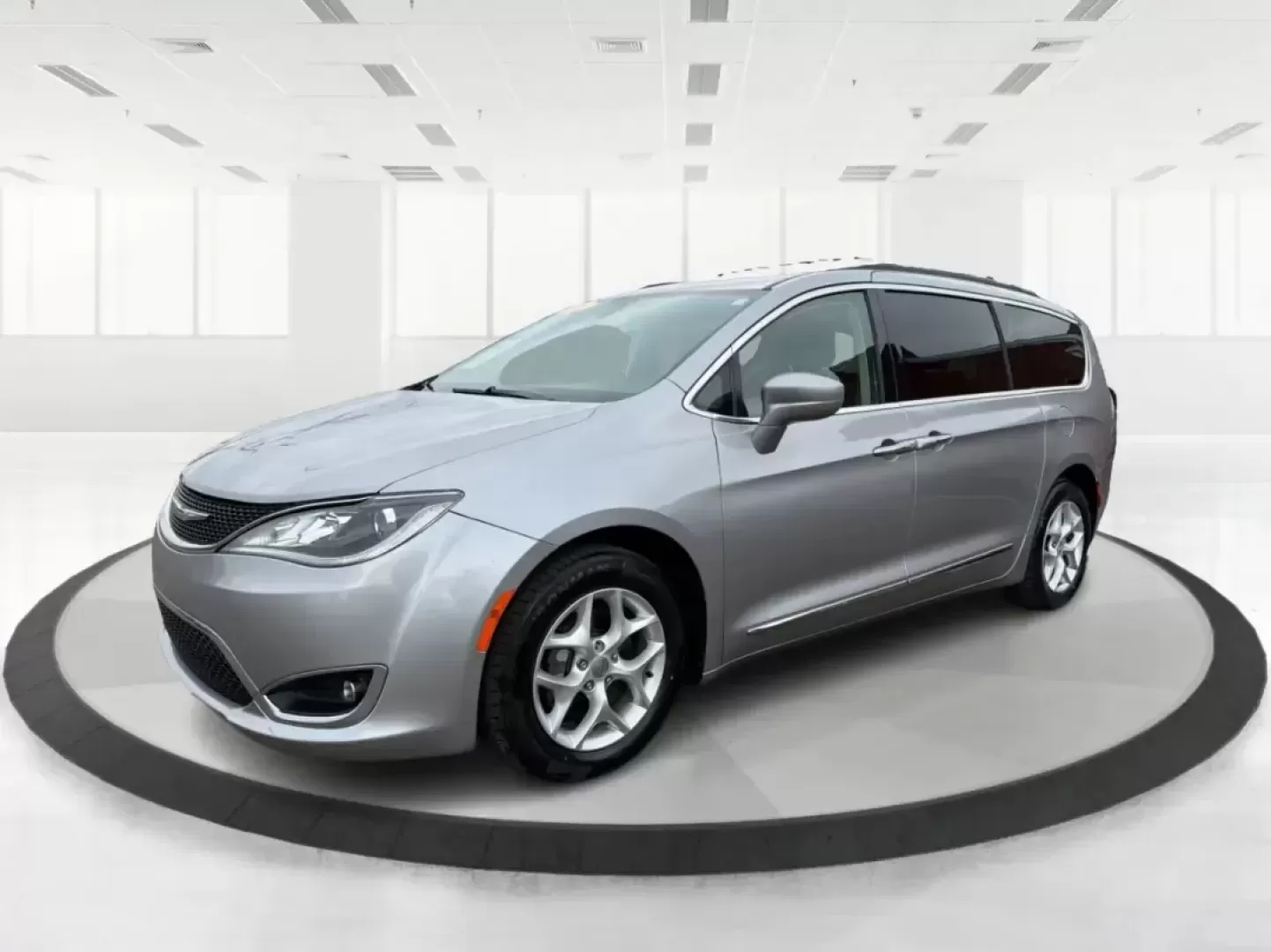 2017 Chrysler Pacifica Touring-L (2C4RC1BG1HR) with an Pentastar 3.6L V-6 DOHC engine, 6A transmission, located at 401 Woodman Dr, Riverside, OH, 45431, (937) 908-9800, 39.760899, -84.123421 - Life gets busy fast-school drop-offs, long commutes, weekend tournaments, and road trips that somehow require half the house. If you need one vehicle that can handle the everyday grind and still feel comfortable when you're headed out for a family getaway, this **2017 Chrysler Pacifica Touring-L** i - Photo#8