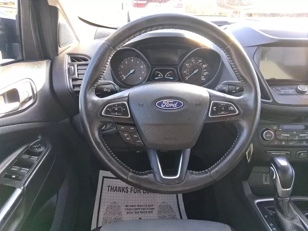 2019 Ford Escape SE (1FMCU0GD6KU) with an 1.5L L4 DOHC 16V engine, 6A transmission, located at 401 Woodman Dr, Riverside, OH, 45431, (937) 908-9800, 39.760899, -84.123421 - Need a dependable SUV for long commutes down I-675, quick school drop-offs, and weekend getaways to Carillon Historical Park or a day at the National Museum of the U.S. Air Force? This 2019 Ford Escape SE in Agate Black Metallic is built for real-life driving in and around Riverside, Ohio-comfortabl - Photo#16