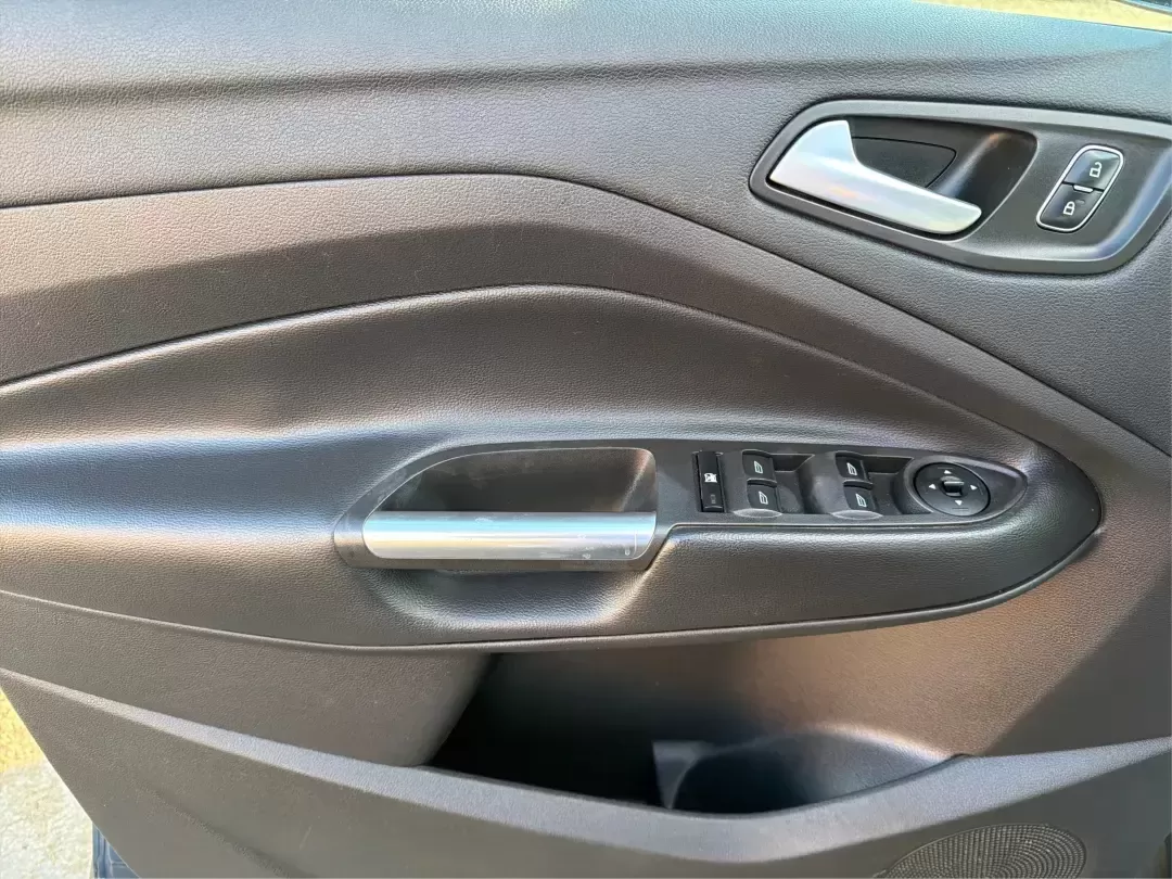 2018 Ford Escape SE (1FMCU9GD4JU) with an 1.5L L4 DOHC 16V engine, 6A transmission, located at 880 E. National Road, Vandalia, OH, 45377, (937) 908-9800, 39.891918, -84.183594 - Picture your next Ohio weekend: loading up the kids for a splash at Splash Xenia, cruising out to John Bryan State Park for a hike, or tackling a snowy morning commute from Beavercreek to downtown Dayton with confidence. This 2018 Ford Escape SE in Blue Metallic is the kind of compact SUV that fits - Photo#19