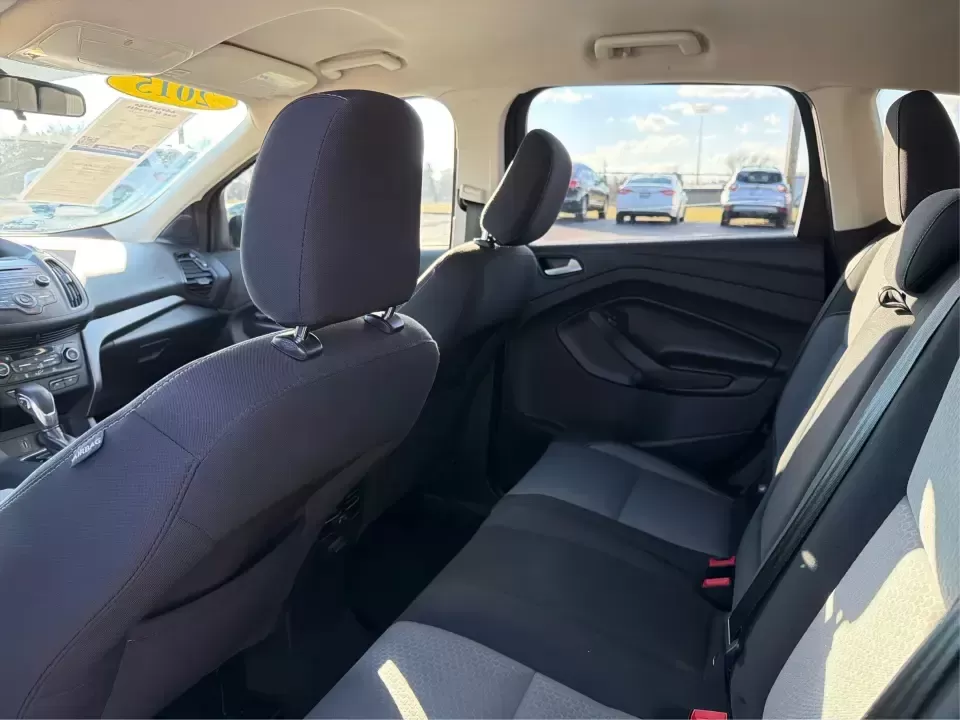 2018 Ford Escape SE (1FMCU9GD4JU) with an 1.5L L4 DOHC 16V engine, 6A transmission, located at 880 E. National Road, Vandalia, OH, 45377, (937) 908-9800, 39.891918, -84.183594 - Picture your next Ohio weekend: loading up the kids for a splash at Splash Xenia, cruising out to John Bryan State Park for a hike, or tackling a snowy morning commute from Beavercreek to downtown Dayton with confidence. This 2018 Ford Escape SE in Blue Metallic is the kind of compact SUV that fits - Photo#10