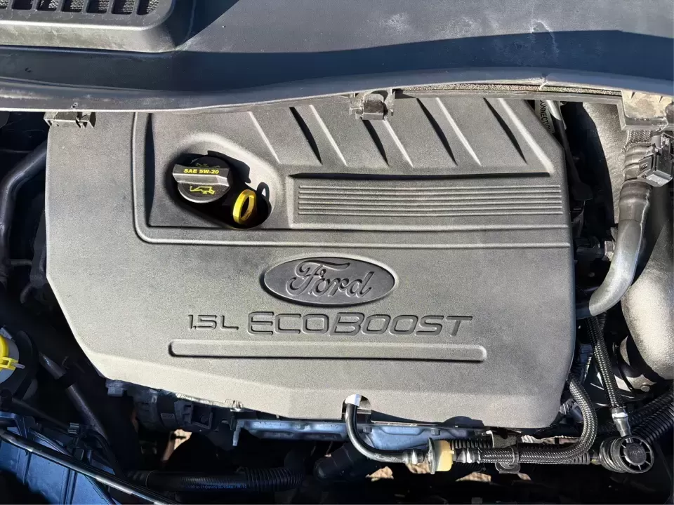 2018 Ford Escape SE (1FMCU9GD4JU) with an 1.5L L4 DOHC 16V engine, 6A transmission, located at 880 E. National Road, Vandalia, OH, 45377, (937) 908-9800, 39.891918, -84.183594 - Picture your next Ohio weekend: loading up the kids for a splash at Splash Xenia, cruising out to John Bryan State Park for a hike, or tackling a snowy morning commute from Beavercreek to downtown Dayton with confidence. This 2018 Ford Escape SE in Blue Metallic is the kind of compact SUV that fits - Photo#11