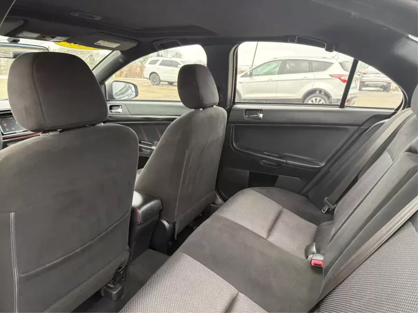 2017 Mitsubishi Lancer LE (JA32U2FU5HU) with an 2L I-4 DOHC engine, 5M transmission, located at 1184 Kauffman Ave, Fairborn, OH, 45324, (937) 908-9800, 39.807072, -84.030914 - Picture your week running smoothly: a dependable commuter sedan for the drive to Dayton, an easy-to-park ride for errands around Xenia Station, and a comfortable car that's ready for a spontaneous weekend trip to Glen Helen Nature Preserve. This 2017 Mitsubishi Lancer LE is built for real-life routi - Photo#10