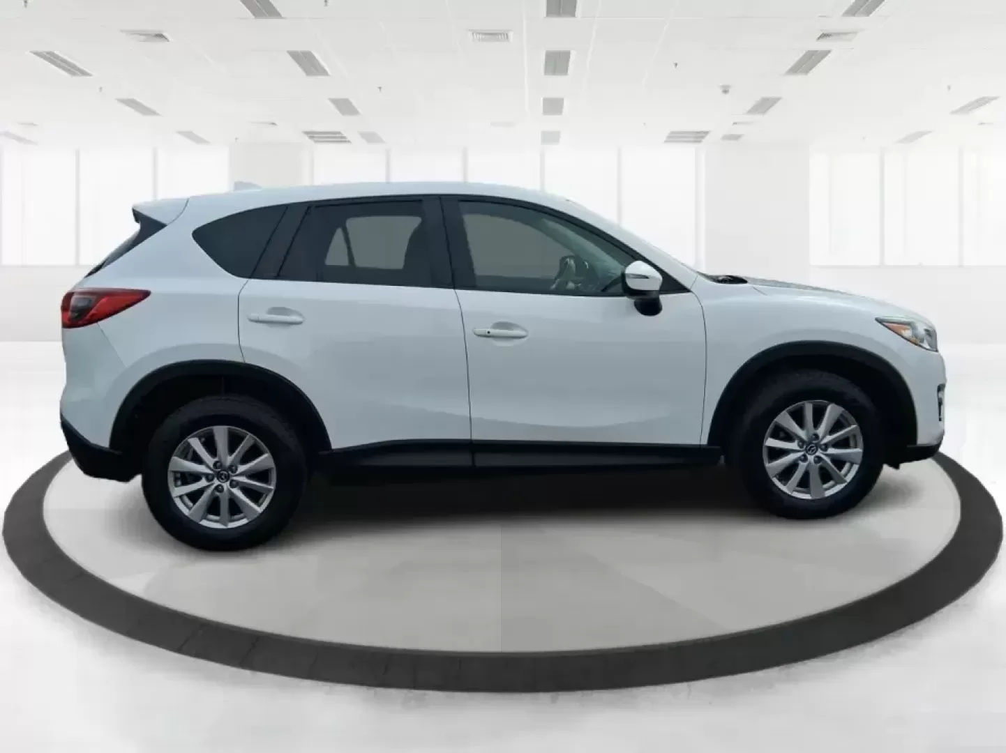 2016 Mazda CX-5 Touring (JM3KE4CY4G0) with an SKYACTIV-G 2.5L I-4 gasoline direct injection engine, 6-Speed Automatic transmission, located at 401 Woodman Dr, Riverside, OH, 45431, (937) 908-9800, 39.760899, -84.123421 - Weekend getaways to John Bryan State Park, everyday commuting down Woodman Dr, or hauling groceries back from The Greene-this 2016 Mazda CX-5 Touring is the kind of SUV that fits real life in Riverside, Ohio. With confident all-weather capability and a smart, comfortable cabin, it's a practical choi - Photo#1