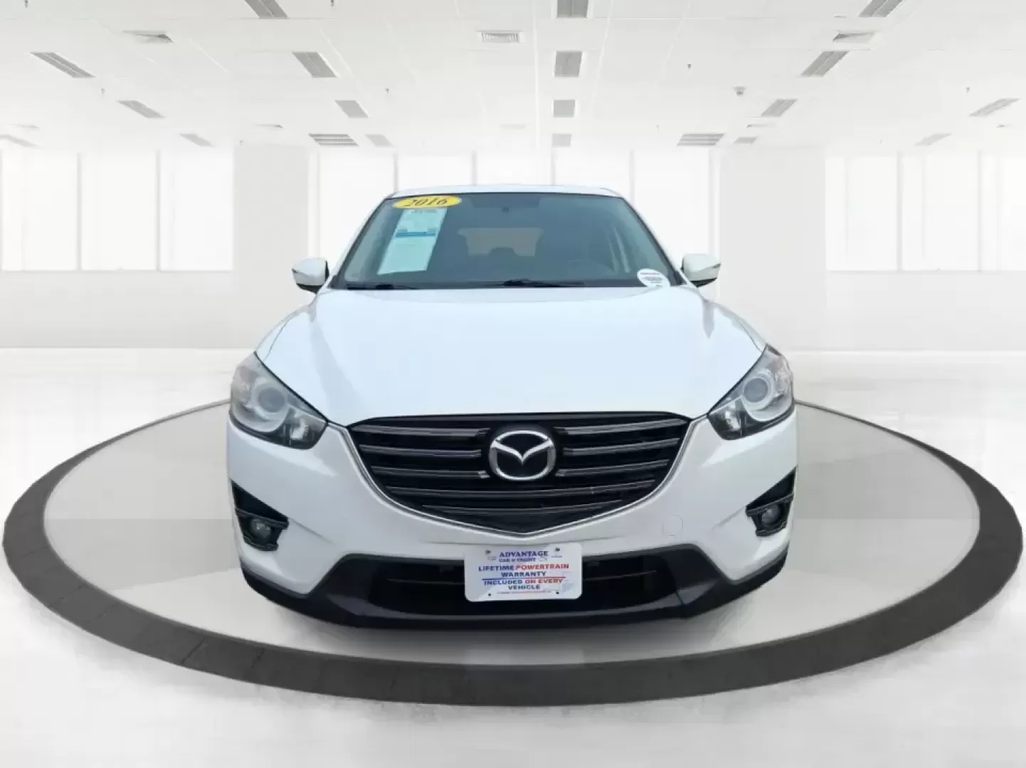 2016 Mazda CX-5 Touring (JM3KE4CY4G0) with an SKYACTIV-G 2.5L I-4 gasoline direct injection engine, 6-Speed Automatic transmission, located at 401 Woodman Dr, Riverside, OH, 45431, (937) 908-9800, 39.760899, -84.123421 - Weekend getaways to John Bryan State Park, everyday commuting down Woodman Dr, or hauling groceries back from The Greene-this 2016 Mazda CX-5 Touring is the kind of SUV that fits real life in Riverside, Ohio. With confident all-weather capability and a smart, comfortable cabin, it's a practical choi - Photo#7