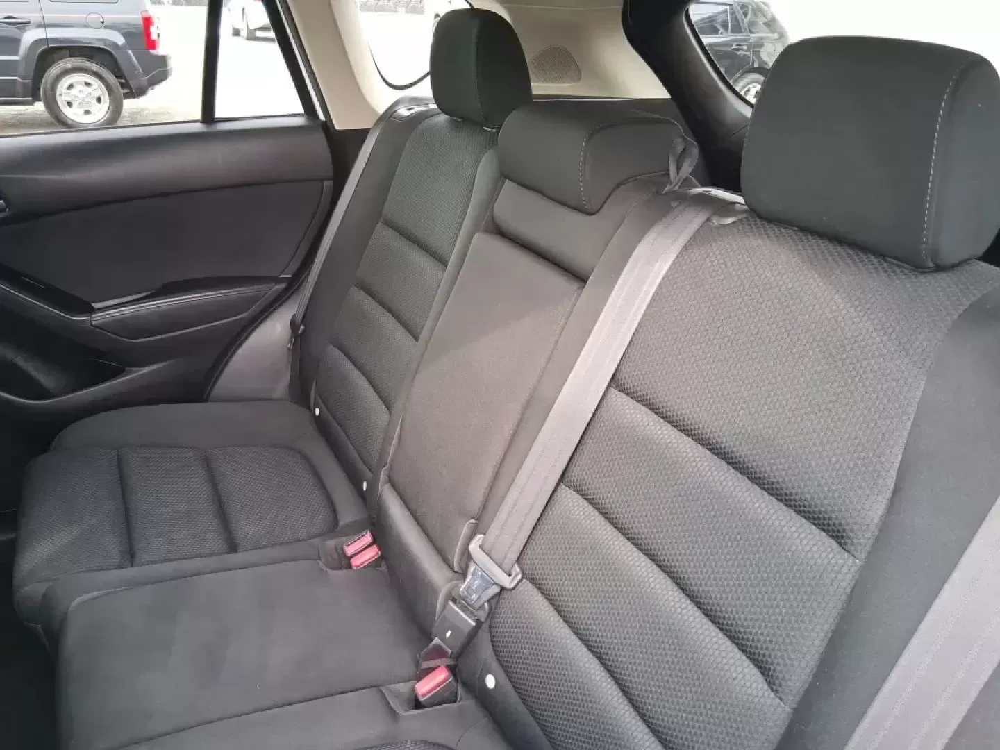2016 Mazda CX-5 Touring (JM3KE4CY4G0) with an SKYACTIV-G 2.5L I-4 gasoline direct injection engine, 6-Speed Automatic transmission, located at 401 Woodman Dr, Riverside, OH, 45431, (937) 908-9800, 39.760899, -84.123421 - Weekend getaways to John Bryan State Park, everyday commuting down Woodman Dr, or hauling groceries back from The Greene-this 2016 Mazda CX-5 Touring is the kind of SUV that fits real life in Riverside, Ohio. With confident all-weather capability and a smart, comfortable cabin, it's a practical choi - Photo#10