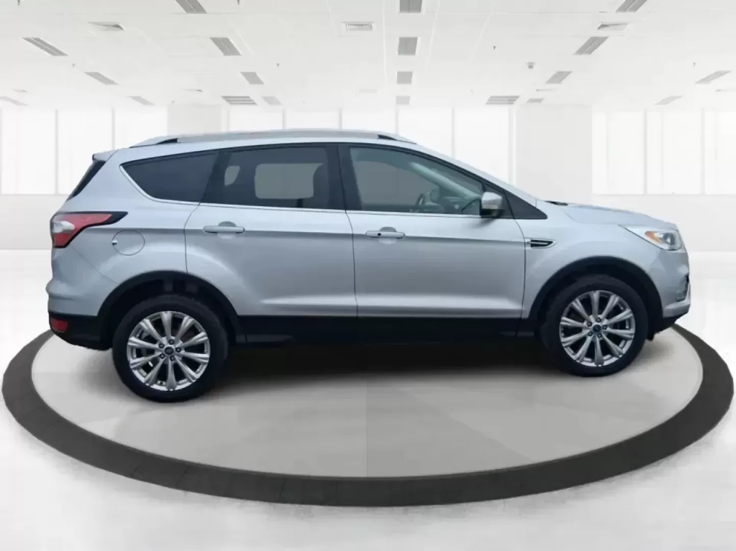 2017 Ford Escape Titanium (1FMCU9J9XHU) with an 2.0L L4 DOHC 16V engine, 6A transmission, located at 401 Woodman Dr, Riverside, OH, 45431, (937) 908-9800, 39.760899, -84.123421 - Picture your next Ohio weekend: a comfortable SUV loaded with gear, cruising down I-75 for a quick Dayton outing, then turning toward the MetroParks for a hike-without worrying about winter weather, tight parking lots, or long-drive fatigue. This 2017 Ford Escape Titanium is built for real life in M - Photo#1