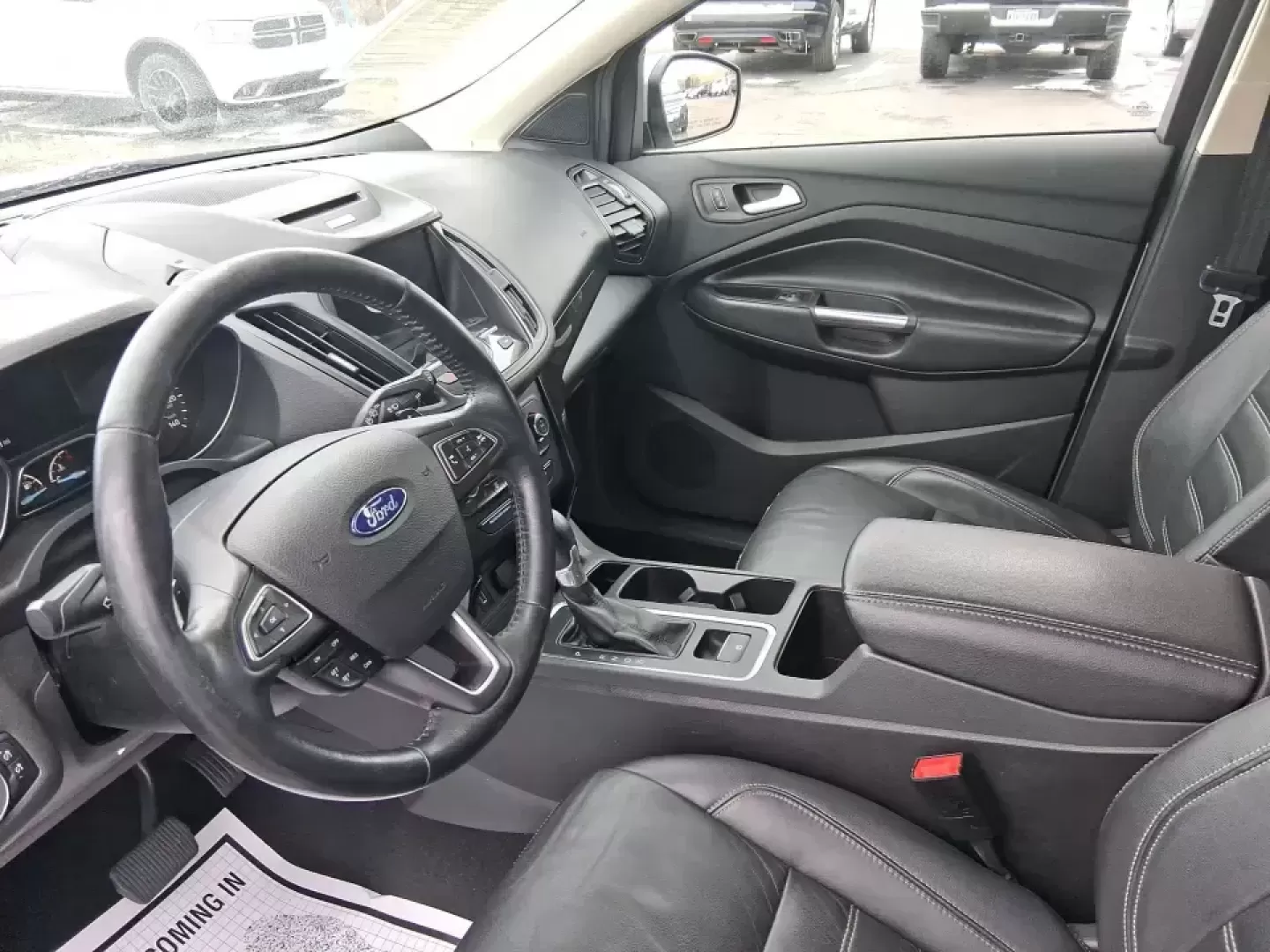 2017 Ford Escape Titanium (1FMCU9J9XHU) with an 2.0L L4 DOHC 16V engine, 6A transmission, located at 401 Woodman Dr, Riverside, OH, 45431, (937) 908-9800, 39.760899, -84.123421 - Picture your next Ohio weekend: a comfortable SUV loaded with gear, cruising down I-75 for a quick Dayton outing, then turning toward the MetroParks for a hike-without worrying about winter weather, tight parking lots, or long-drive fatigue. This 2017 Ford Escape Titanium is built for real life in M - Photo#9