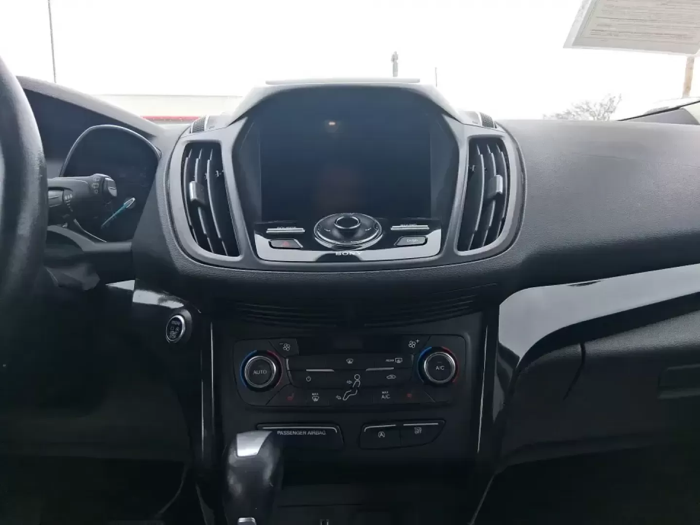 2017 Ford Escape Titanium (1FMCU9J9XHU) with an 2.0L L4 DOHC 16V engine, 6A transmission, located at 401 Woodman Dr, Riverside, OH, 45431, (937) 908-9800, 39.760899, -84.123421 - Picture your next Ohio weekend: a comfortable SUV loaded with gear, cruising down I-75 for a quick Dayton outing, then turning toward the MetroParks for a hike-without worrying about winter weather, tight parking lots, or long-drive fatigue. This 2017 Ford Escape Titanium is built for real life in M - Photo#13