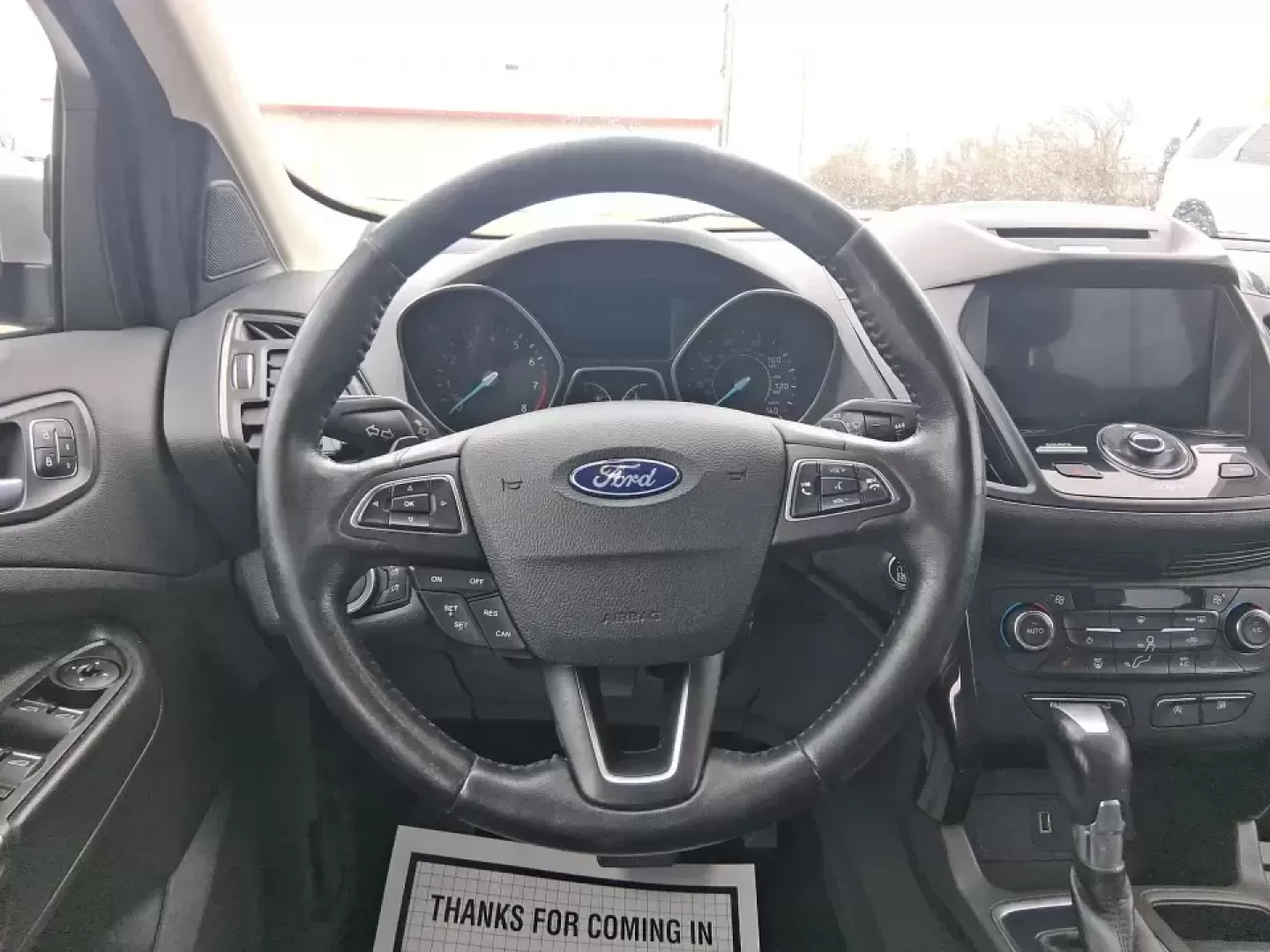 2017 Ford Escape Titanium (1FMCU9J9XHU) with an 2.0L L4 DOHC 16V engine, 6A transmission, located at 401 Woodman Dr, Riverside, OH, 45431, (937) 908-9800, 39.760899, -84.123421 - Picture your next Ohio weekend: a comfortable SUV loaded with gear, cruising down I-75 for a quick Dayton outing, then turning toward the MetroParks for a hike-without worrying about winter weather, tight parking lots, or long-drive fatigue. This 2017 Ford Escape Titanium is built for real life in M - Photo#16