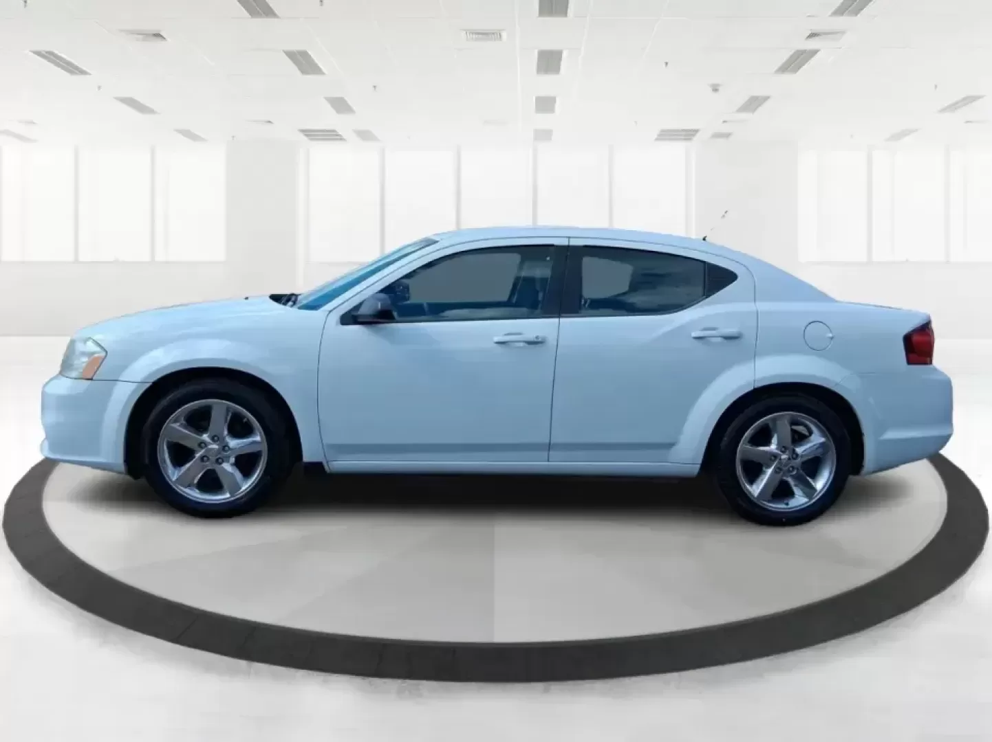 2014 Dodge Avenger SE (1C3CDZAB7EN) with an 2.4L L4 DOHC 16V engine, 4-Speed Automatic transmission, located at 4508 South Dixie Dr, Moraine, OH, 45439, (937) 908-9800, 39.689976, -84.218452 - Need a dependable sedan for the daily commute down I-75, quick school drop-offs, or weekend errands around Dayton-without the stress of traditional bank financing? This 2014 Dodge Avenger SE is a practical, comfortable choice for budget-conscious buyers who want a straightforward ride with the right - Photo#5