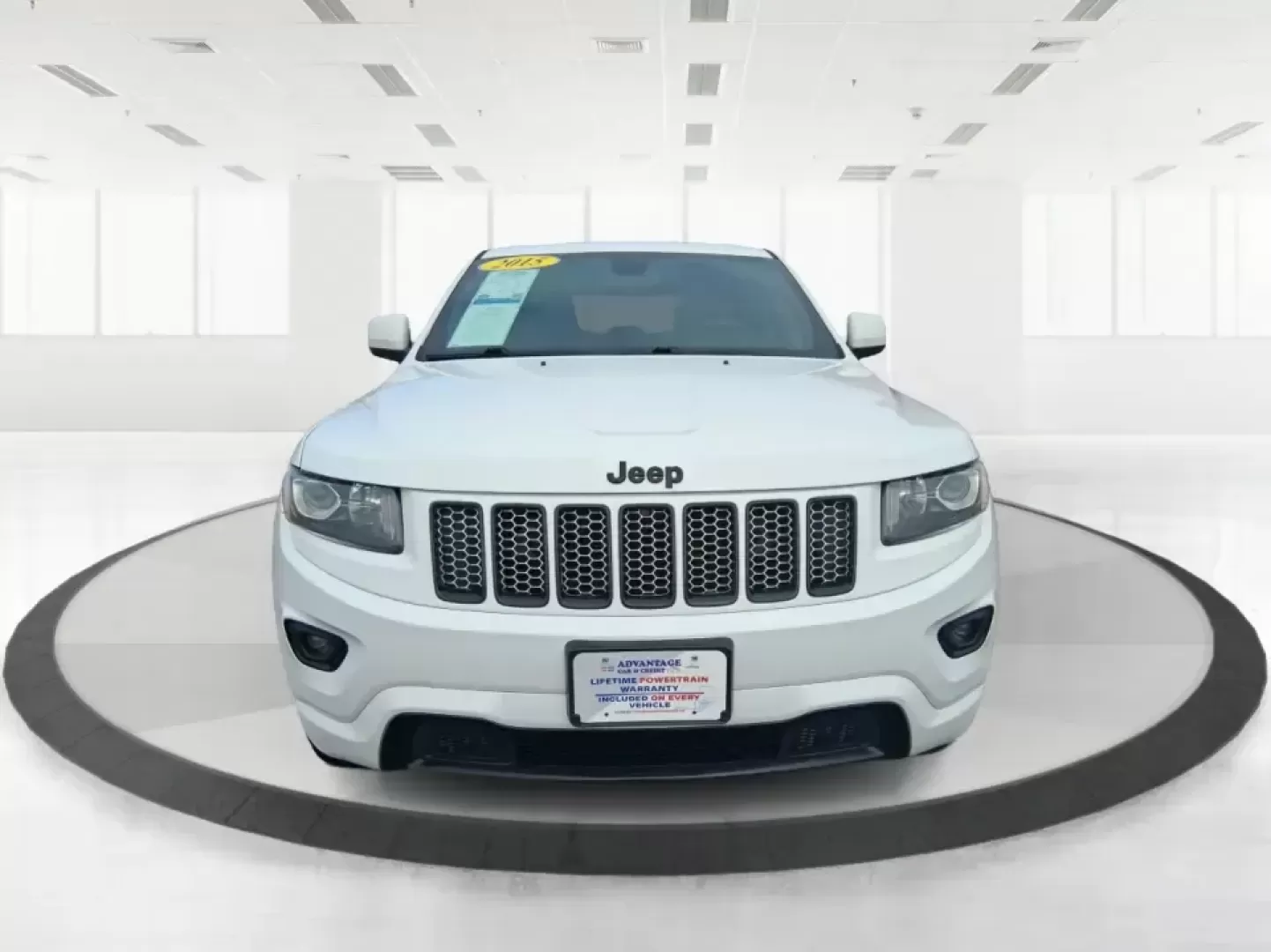 2015 Jeep Grand Cherokee Altitude (1C4RJFAG9FC) with an 3.6L V-6 DOHC engine, 8-Speed Automatic transmission, located at 1099 N County Rd 25A , Troy, OH, 45373, (937) 908-9800, 40.057079, -84.212883 - Weekend getaways to Hocking Hills, snowy school runs, or a confident daily commute up I75 feel easier when your SUV is built for real Ohio weather and real-life schedules. This 2015 Jeep Grand Cherokee Altitude in Bright White Clearcoat is the kind of capable, comfortable SUV that fits busy families - Photo#7